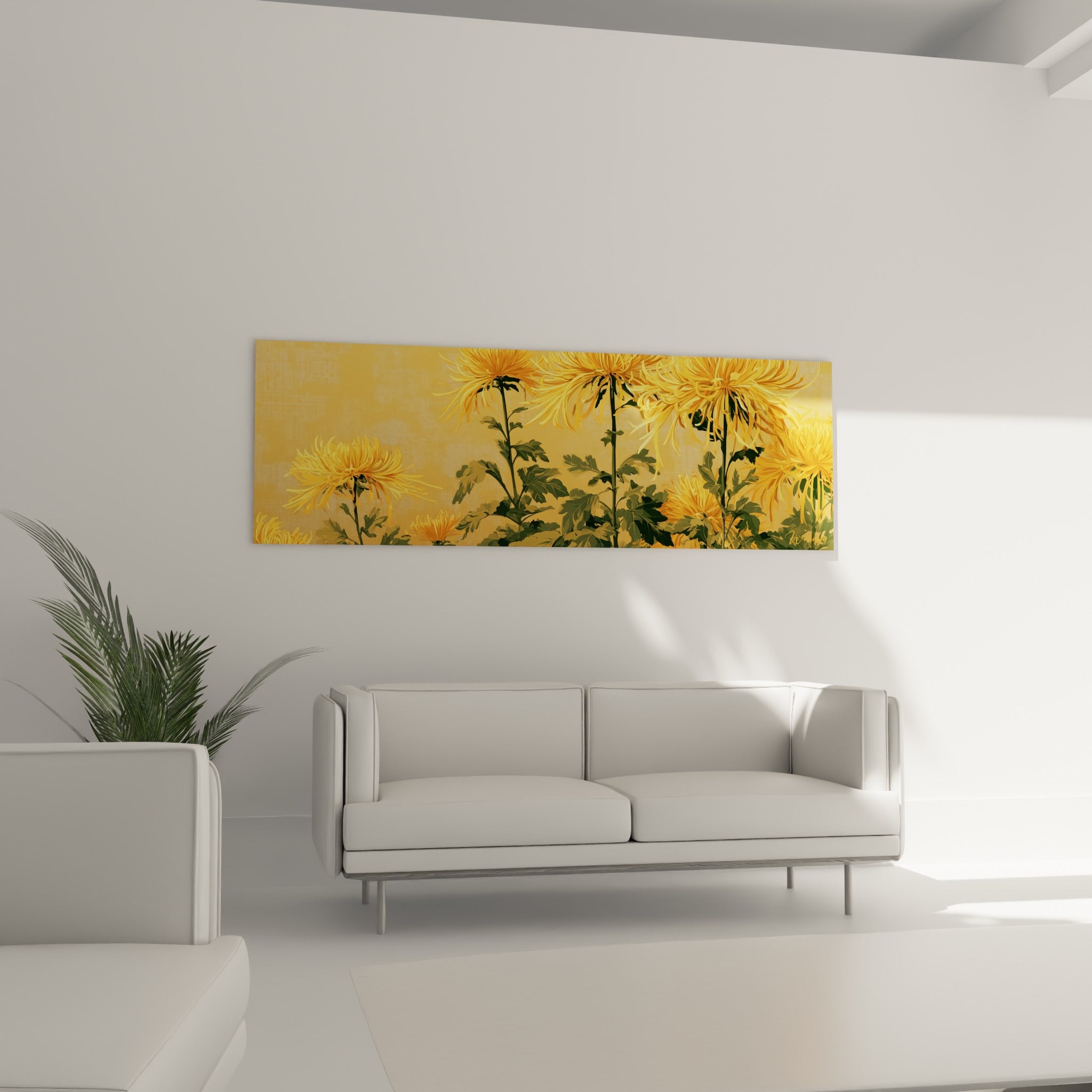 Tiges de chrysanthèmes dorés et feuillage vert accrochés au-dessus d'un canapé dans un salon lumineux