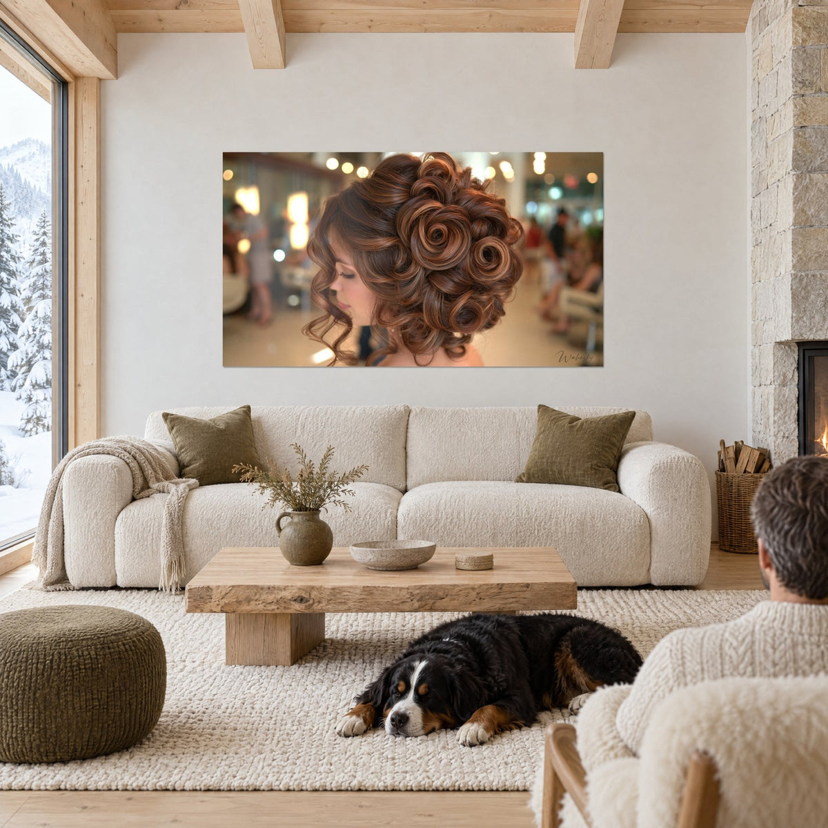 Wall art chignon of chestnut and caramel curls, woman in profile with eyes closed, above a sofa in a bright living room