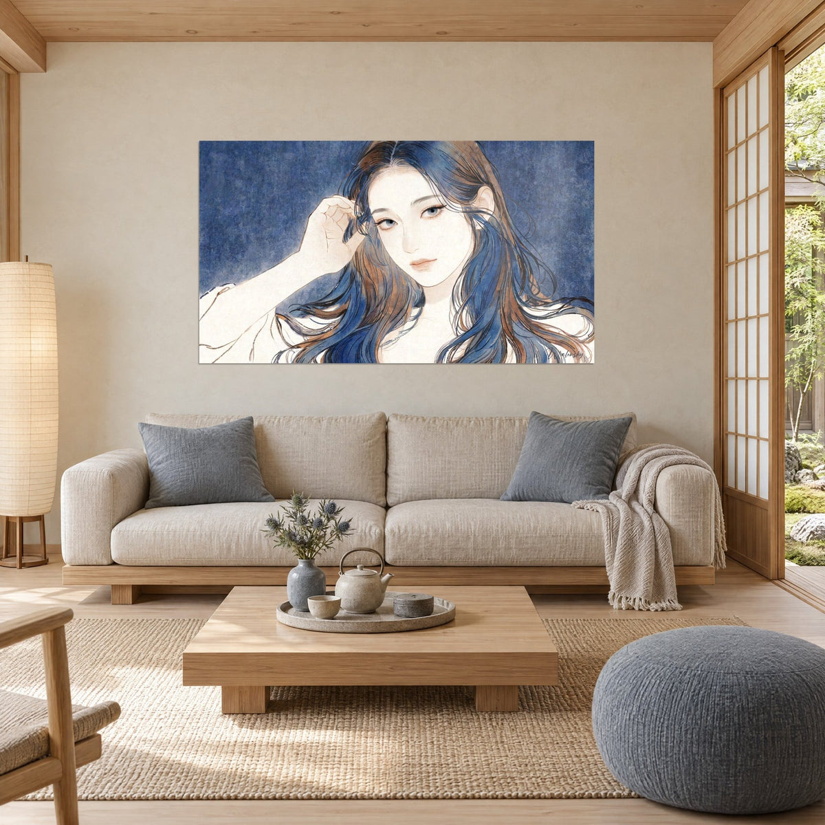 Wall art portrait of a young woman with long ginger and navy blue hair, hand in her hair, indigo background, above a sofa in a bright living room
