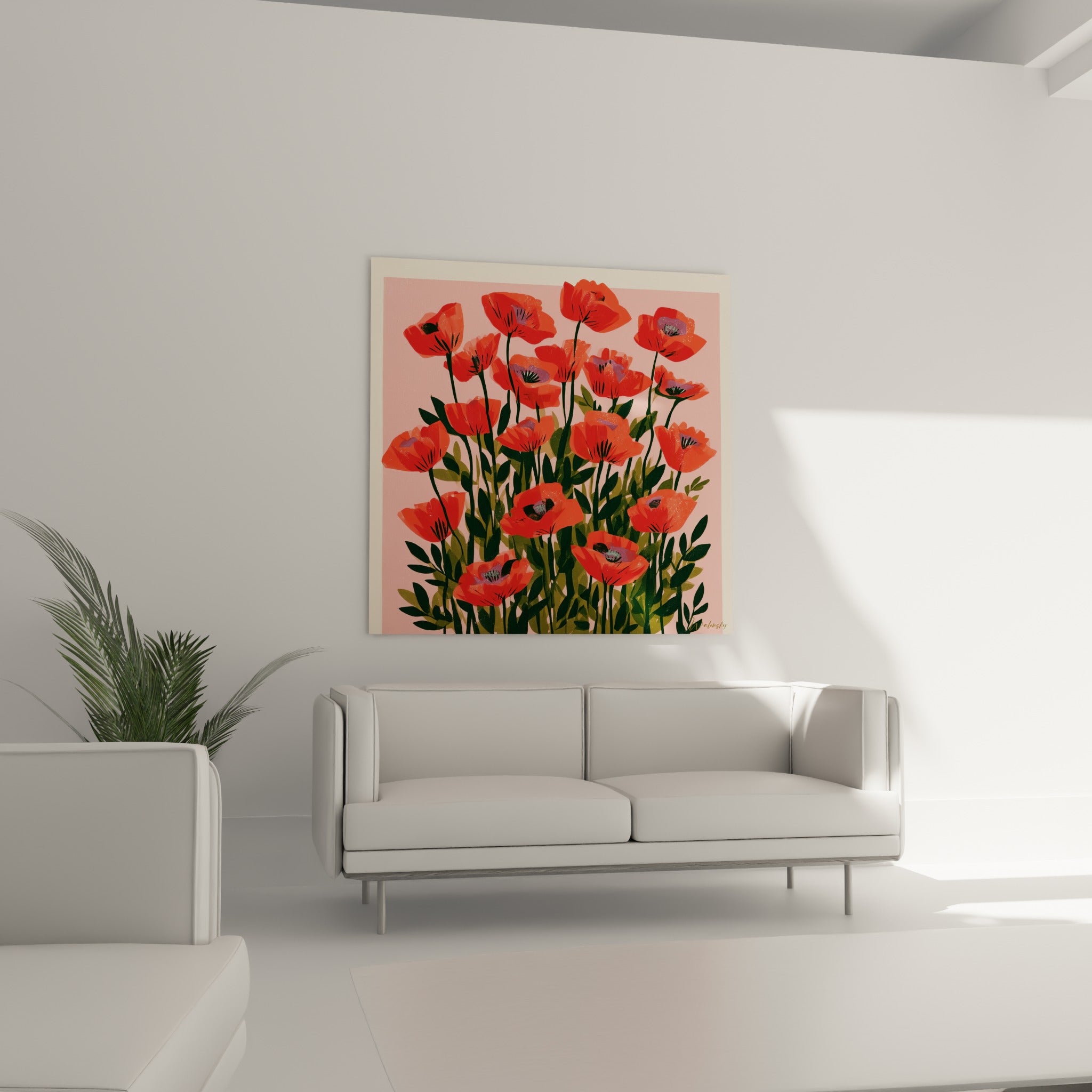 Fleurs de coquelicot rouge vif et feuillage dense positionnées au-dessus d'un canapé dans un salon lumineux