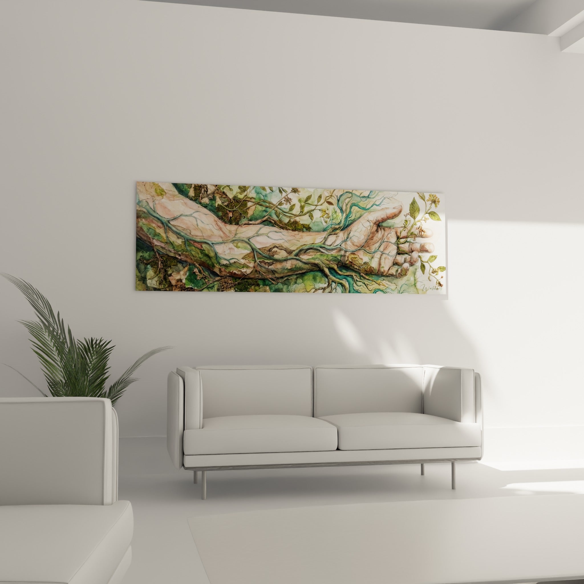 Main tendue de ce corps abstrait entourée de feuillage vert émeraude, au-dessus d'un canapé dans un salon lumineux