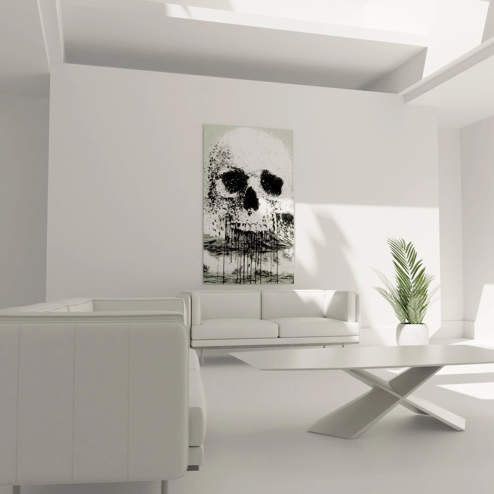 tableau crâne design Walensky accroché au mur d un salon blanc moderne au dessus d un canapé