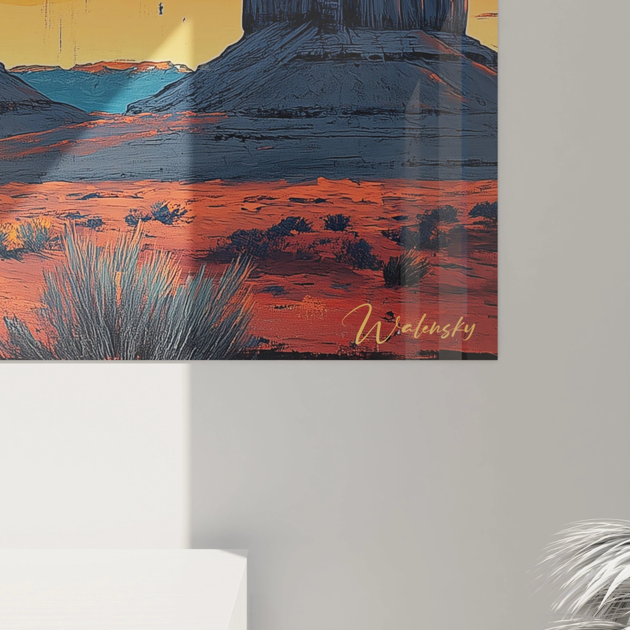 Tableau désert stylisé présentant quatre formations rocheuses verticales, un dégradé orange-bleu dans le ciel et des buissons épars sur un sol rougeâtre.