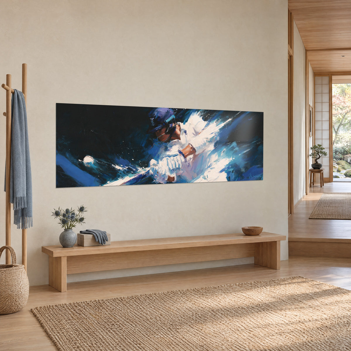 Wall art of a cricket player mid-stroke, indigo helmet and white gloves splashed with blue, light wood hallway