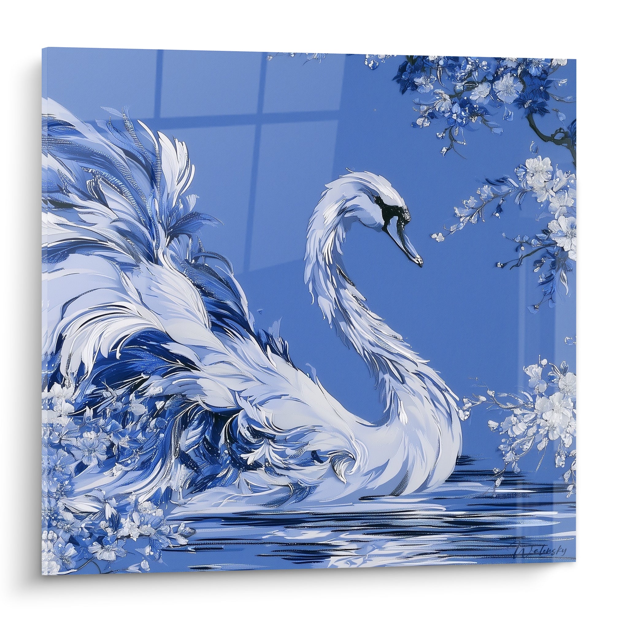 Cygne blanc aux plumes bleu marine déployées près de branches fleuries blanches