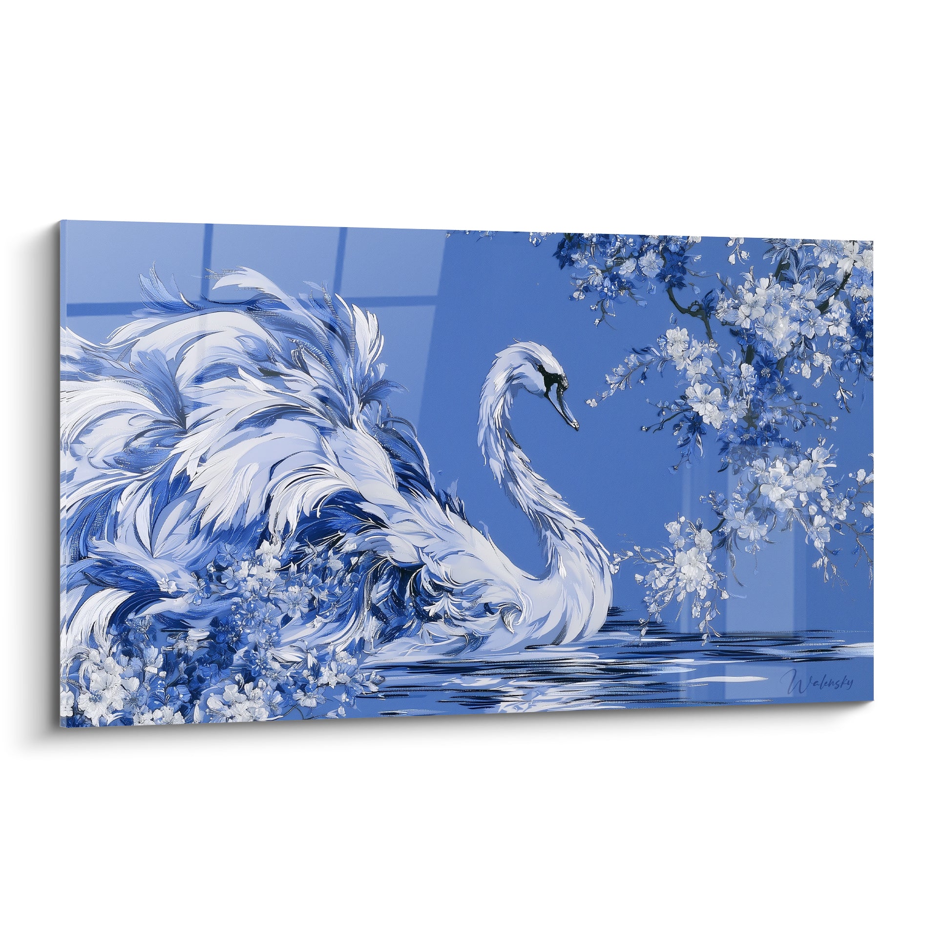 Cygne blanc au plumage bleu marine nageant parmi des fleurs de cerisier blanches
