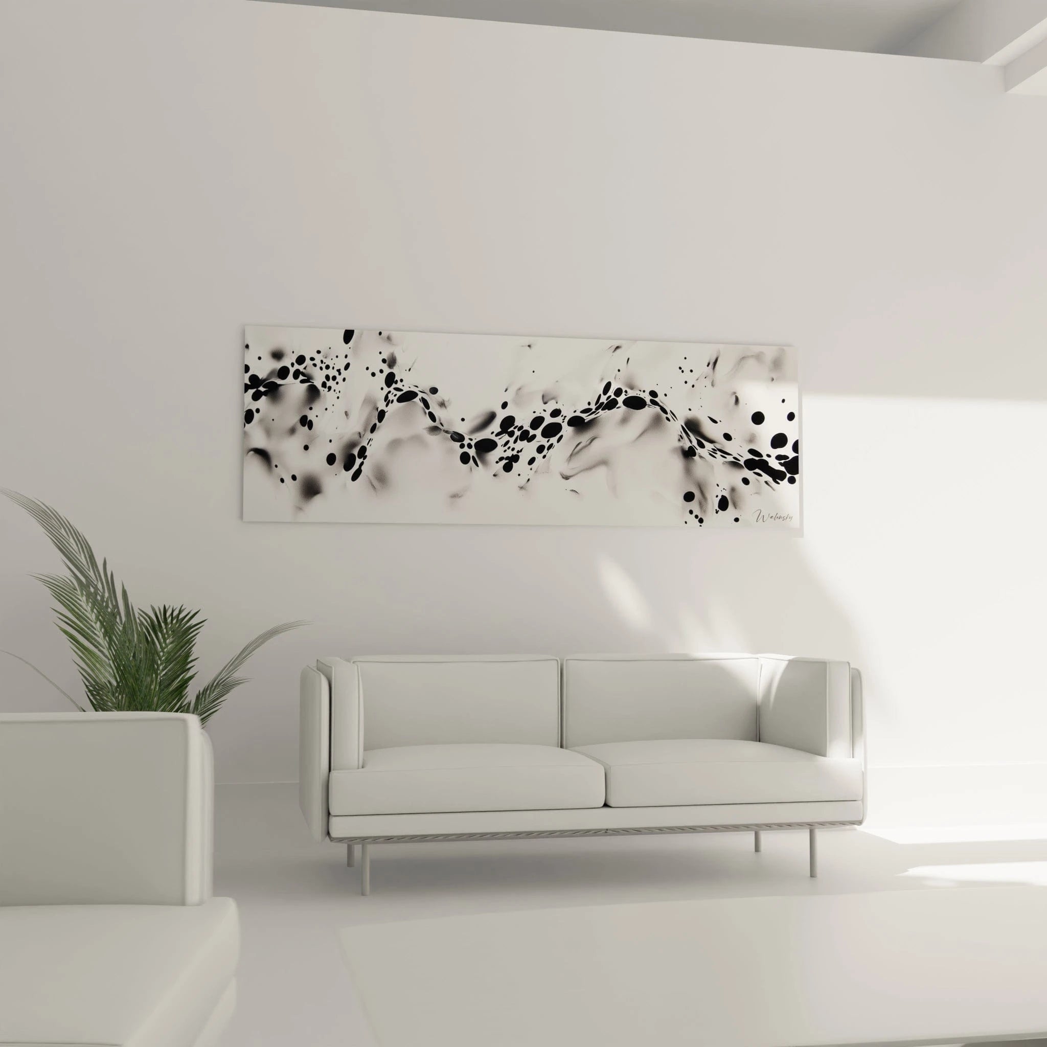 Tableau tacheté noir et blanc Walensky suspendu au-dessus d'un canapé moderne dans un intérieur lumineux