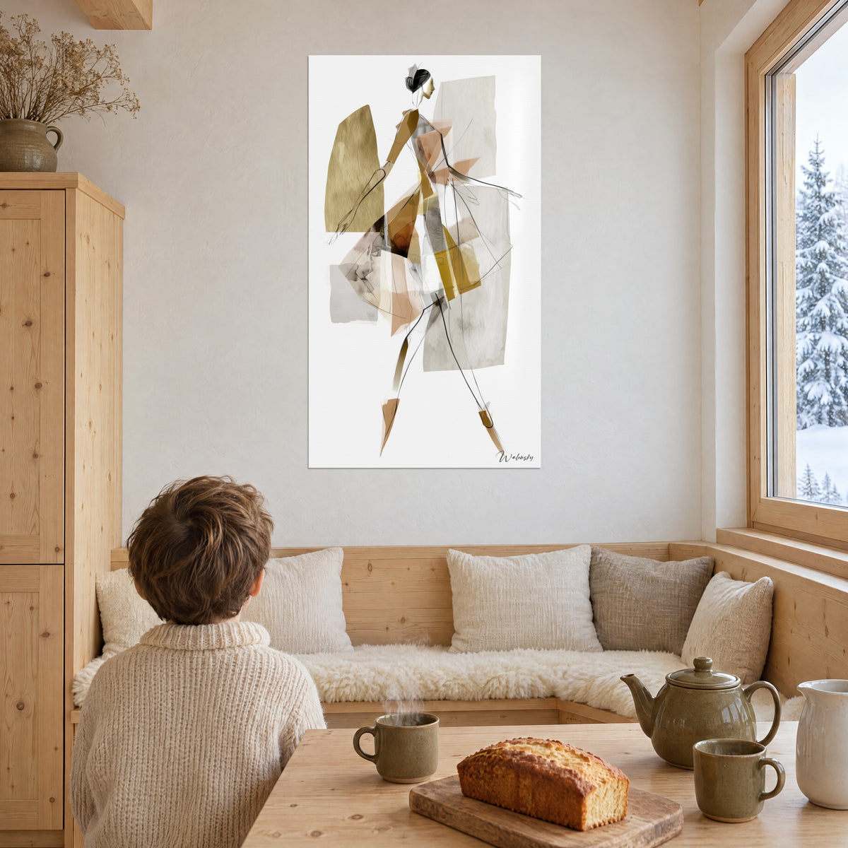Wall art dancing fashion figure in ochre and taupe sheer layers, brown bun, in a wooden dining nook with large windows