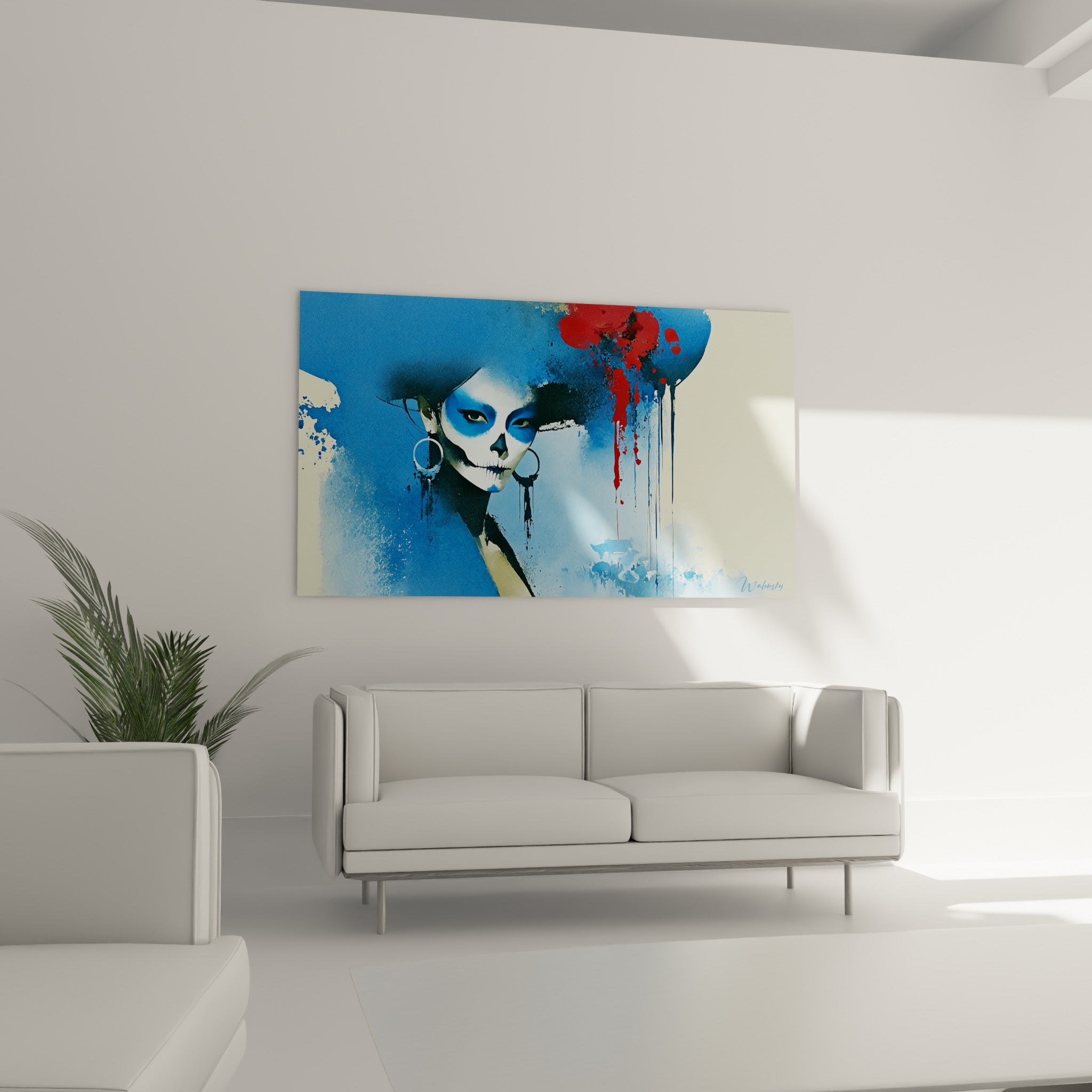 Portrait Dia de los Muertos aux couleurs bleu marine et rouge vif au-dessus d'un canapé dans un salon lumineux