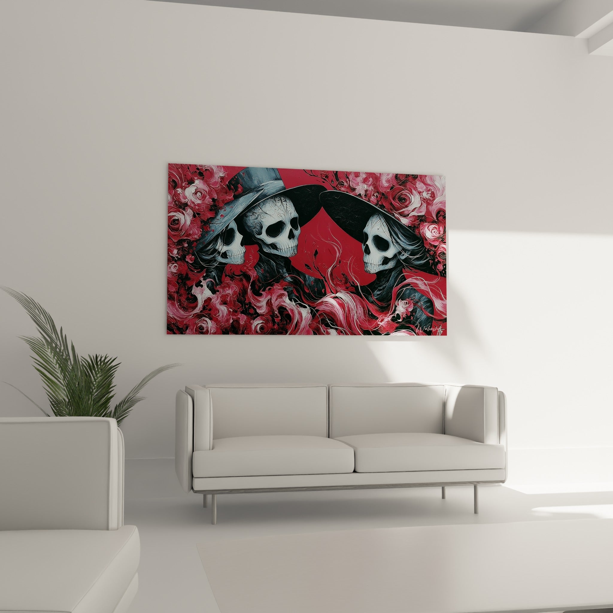 Figures crâniennes rouge et noir enlacées de roses, au-dessus d'un canapé dans un salon lumineux