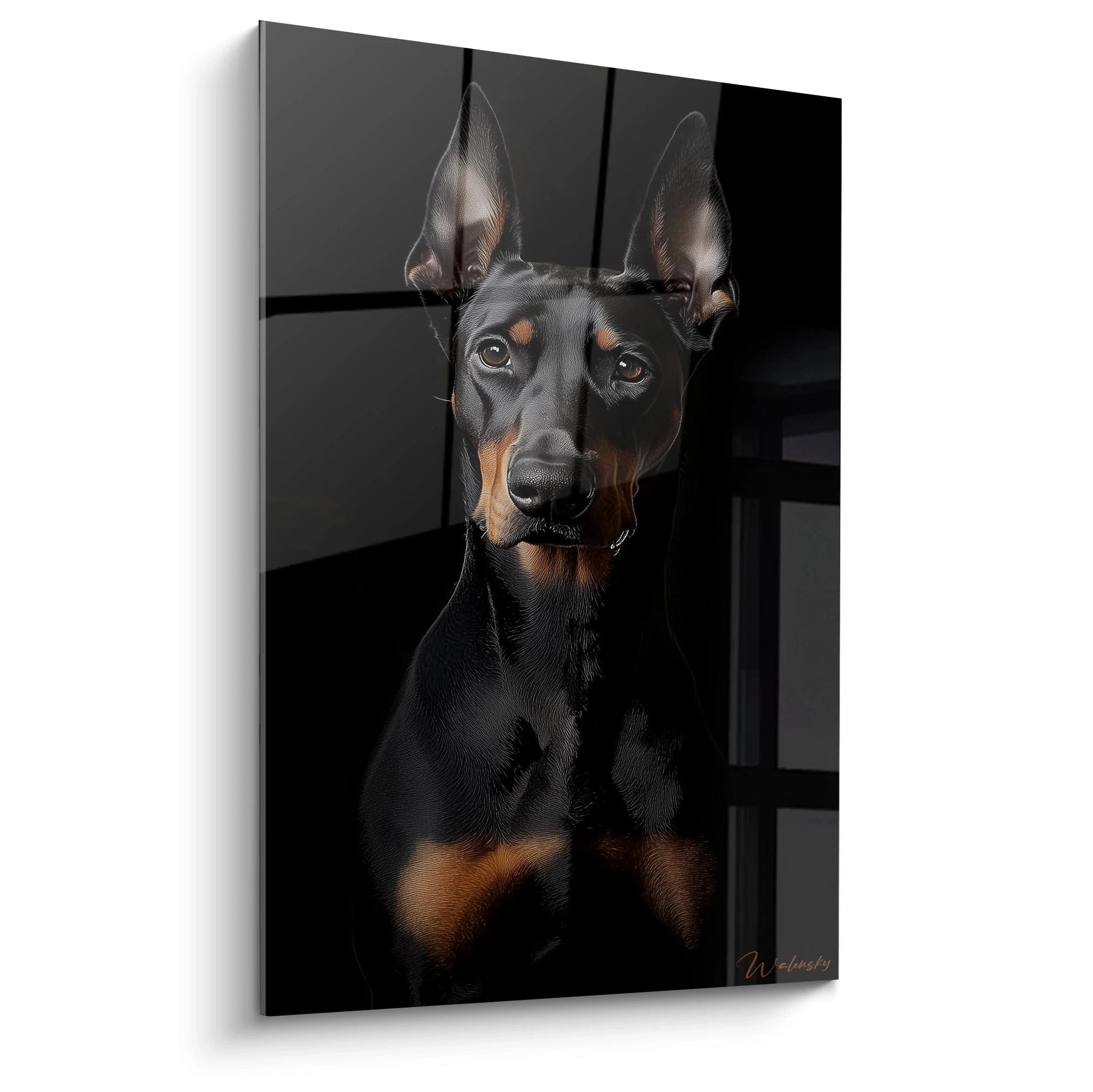 Un tableau Doberman représentant un portrait frontal sur fond noir, mettant en valeur les oreilles dressées et le regard intense. Dominance de noir profond avec touches de marron et bronze sur le museau et la gorge. Textures réalistes du pelage et contrastes marqués.
