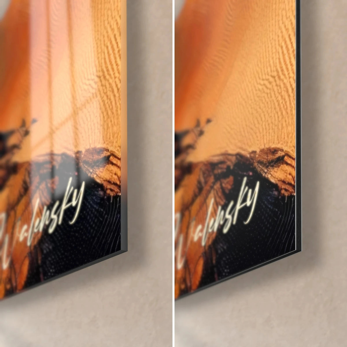 Wall art aerial shoreline, bottom right corner: glossy glass with reflections on the left, matte Dibond on the right, orange sand and black rock