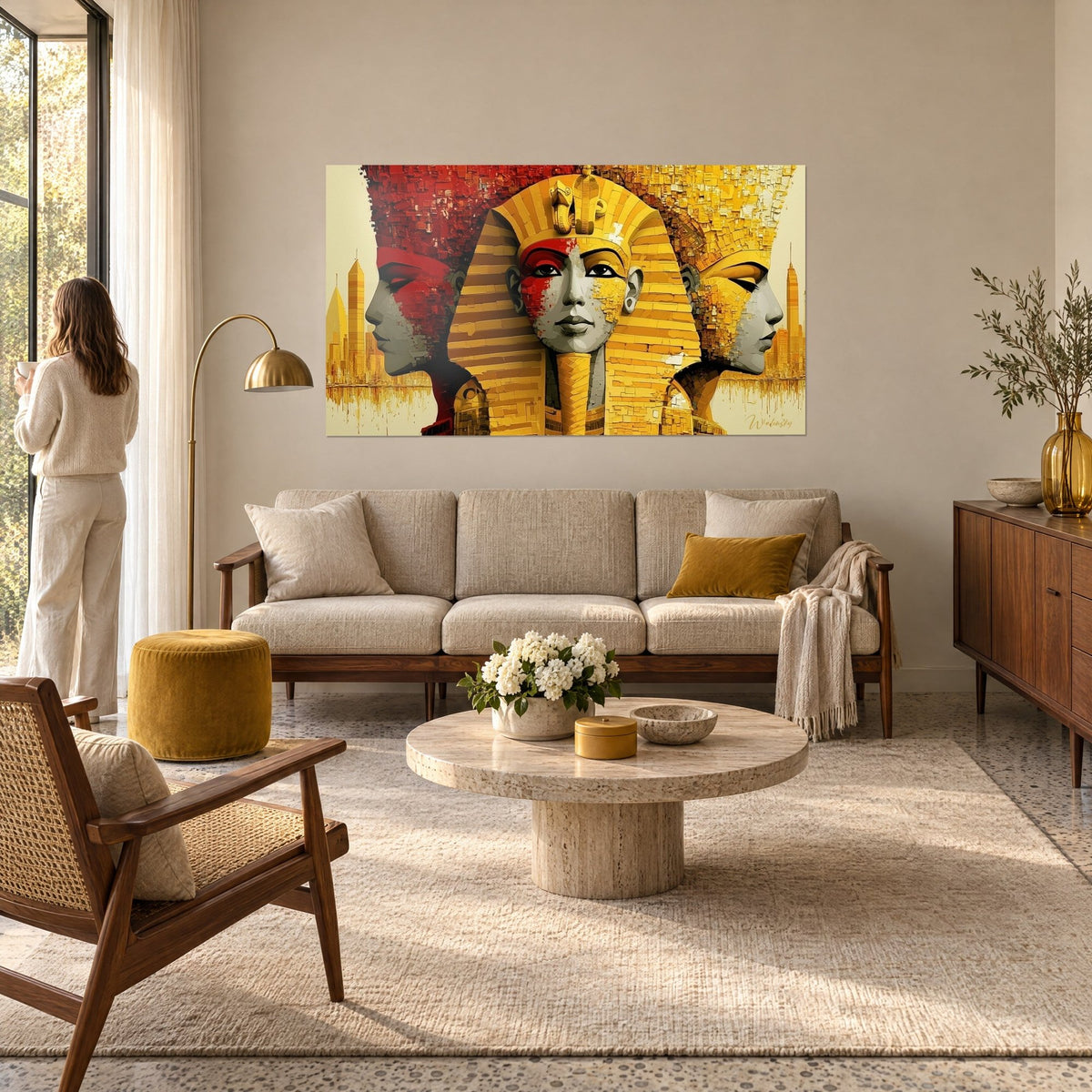 Wall art pharaoh in gold and red nemes, two grey twin profiles, ochre city skyline, hung above a sofa in a bright living room