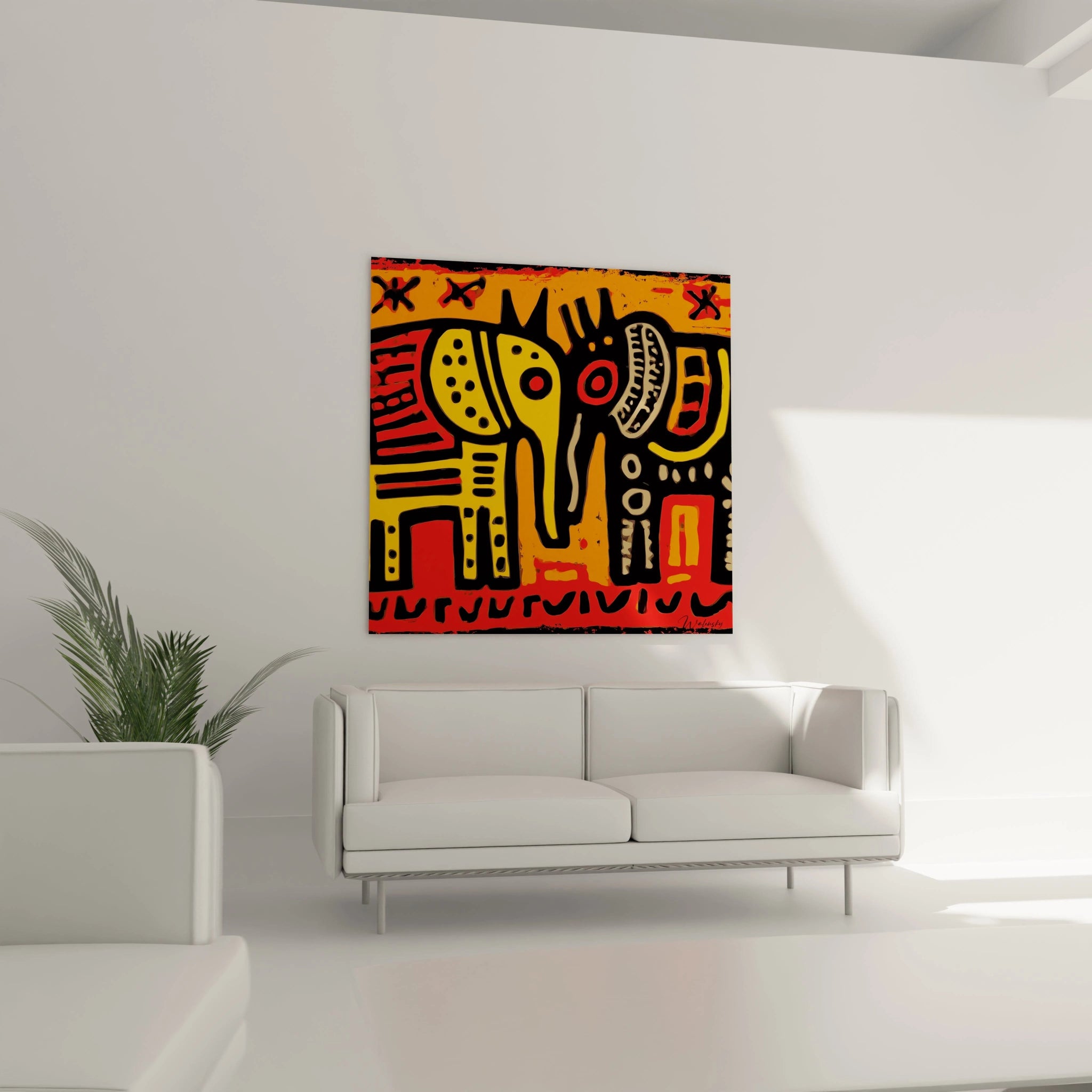 Tableau Walensky tableau éléphant art tribal coloré rouge jaune et noir accroché au mur d un salon moderne