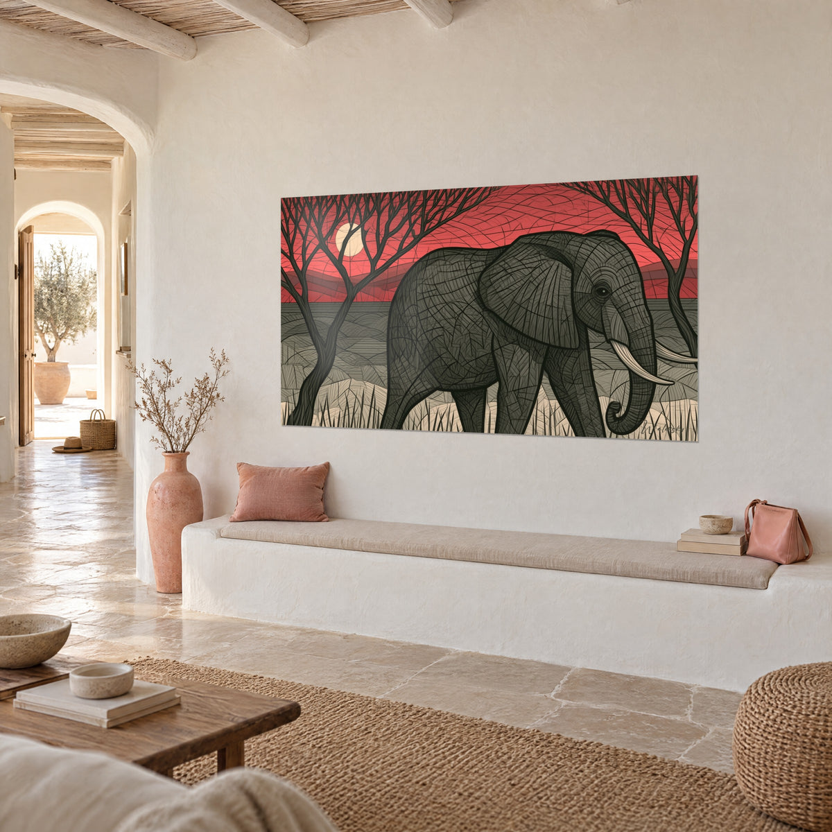 Quadro pachiderma dalle zanne d'avorio, alberi spogli ed erbe beige, parete imbiancata e panca in gesso, vista di tre quarti