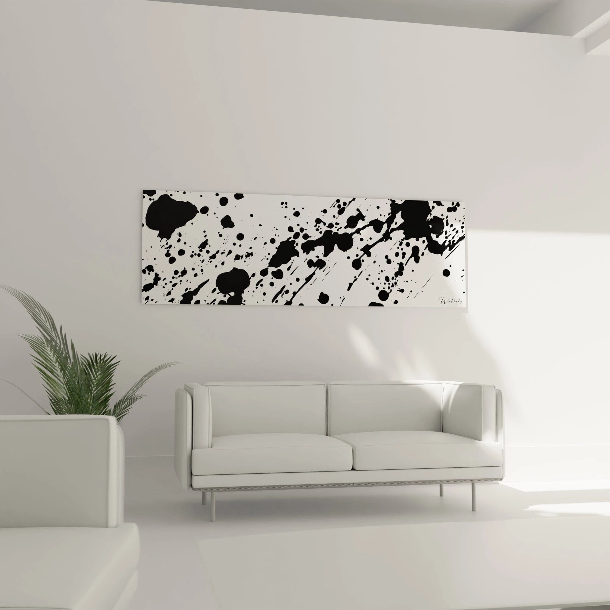 Tableau tacheté noir et blanc de Walensky décorant un salon moderne avec un canapé blanc