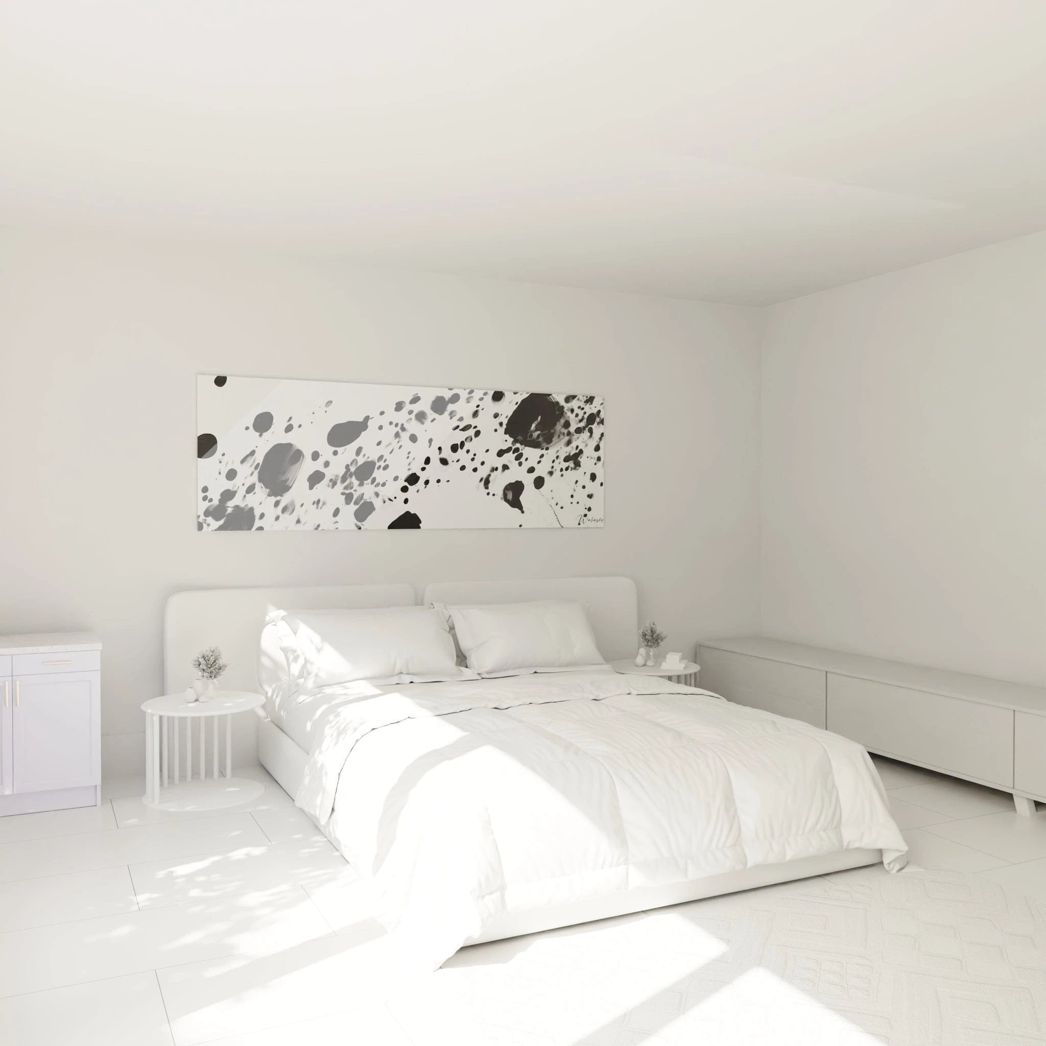 Tableau tacheté noir et blanc Walensky décorant un mur d'une chambre lumineuse et moderne