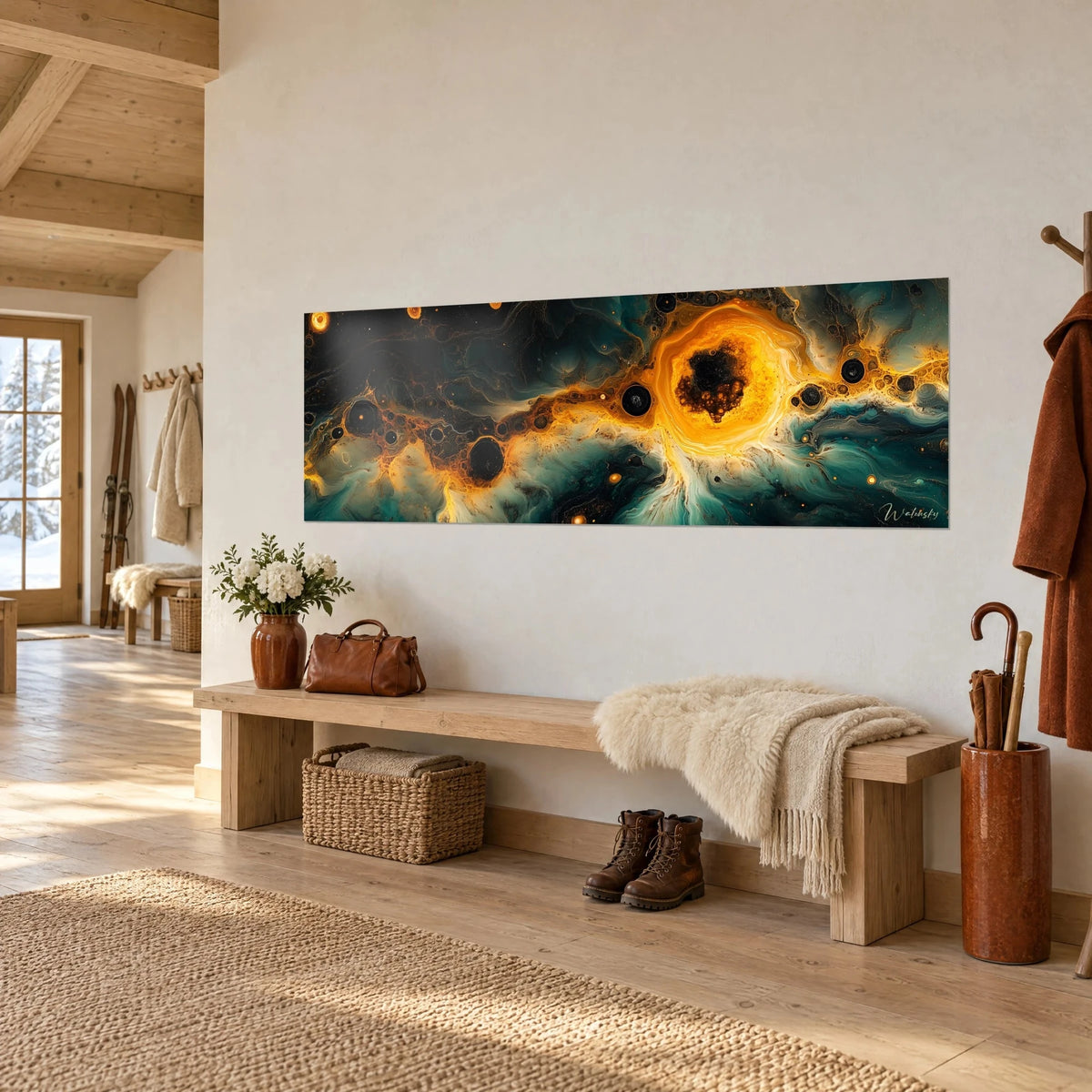 Tableau cratère solaire orange et noir aux volutes turquoise, accroché au-dessus d'un banc en bois d'un chalet clair