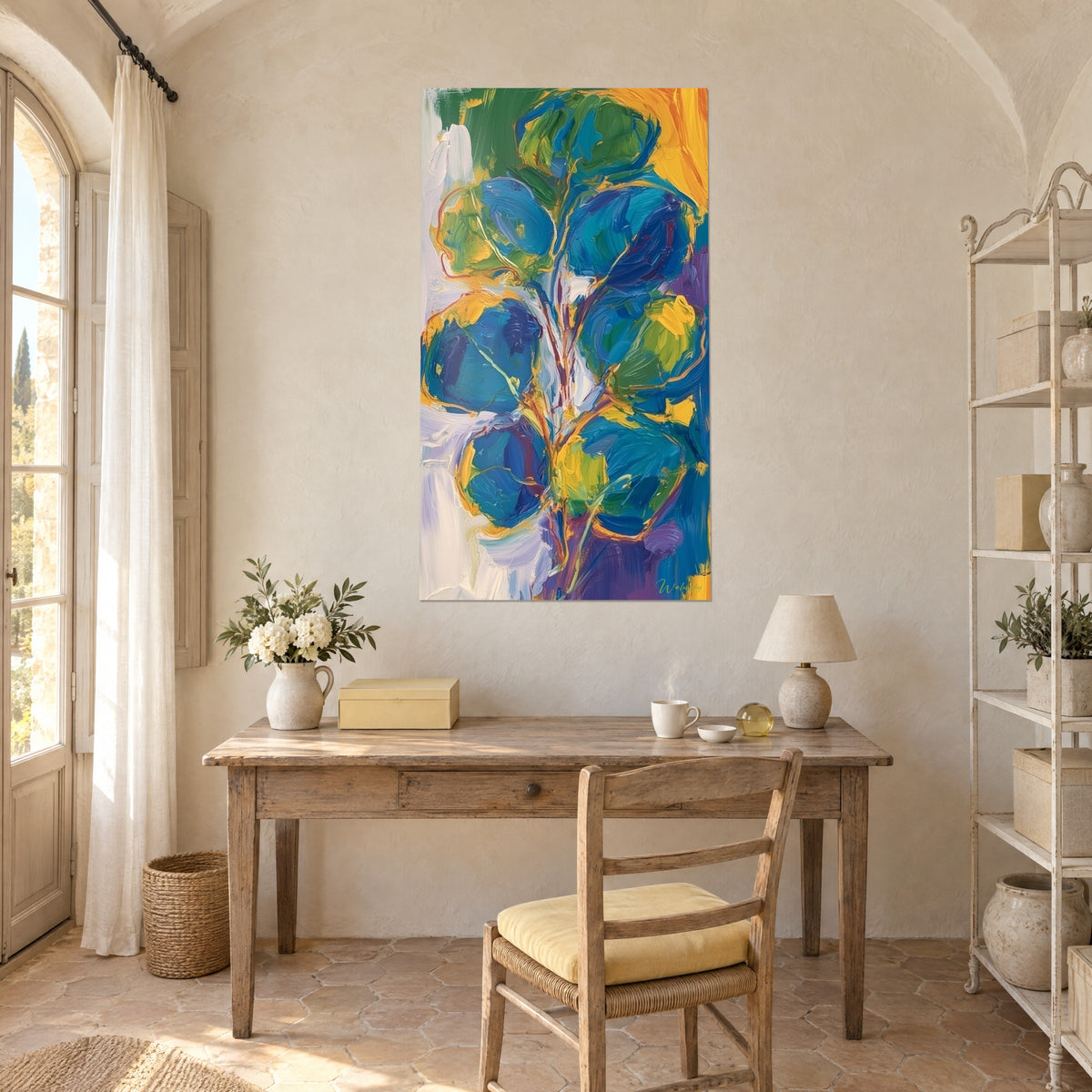 Tableau branchage aux disques bleu canard et vert olive sur fond ivoire, accroché au-dessus d'un bureau en bois et d'une chaise paillée