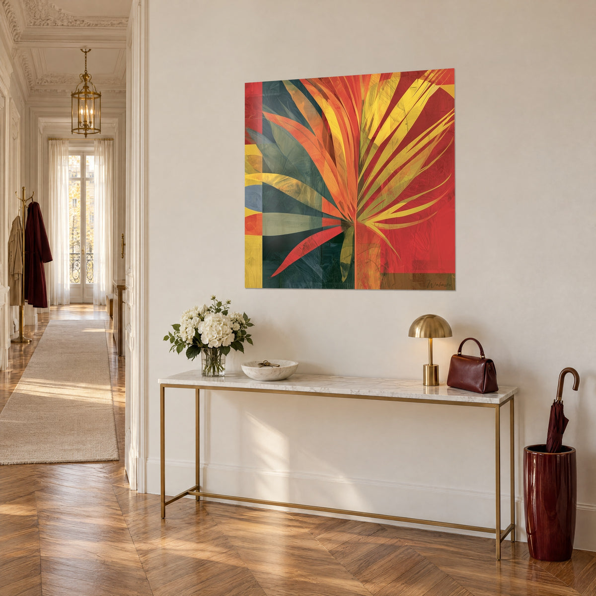 Wall art palm fan in ochre and saffron on carmine red and fir green blocks, above a brass console table