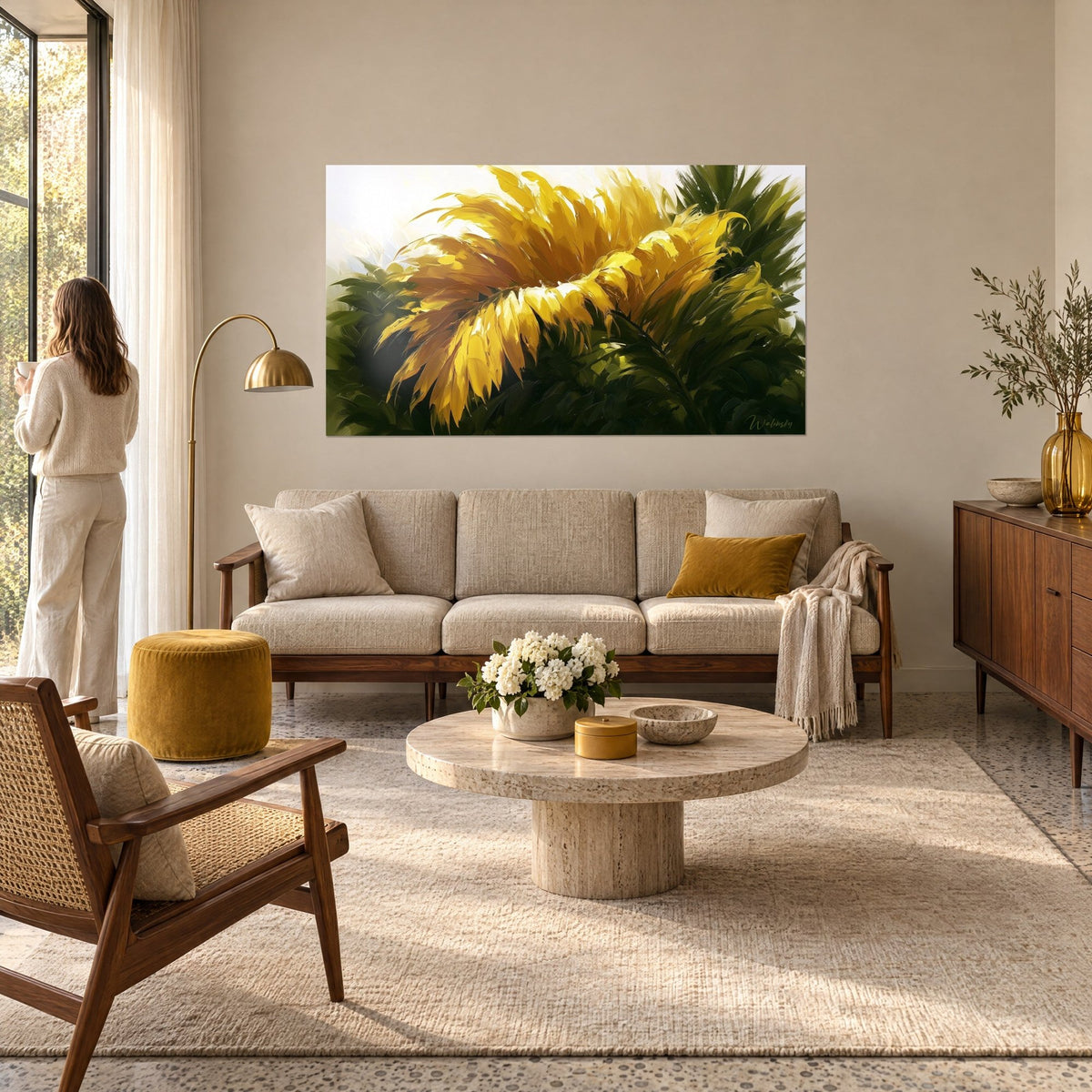 Wall art golden palm with luminous reflections, bright yellow and deep green, a woman seen from behind above a sofa in a bright living room