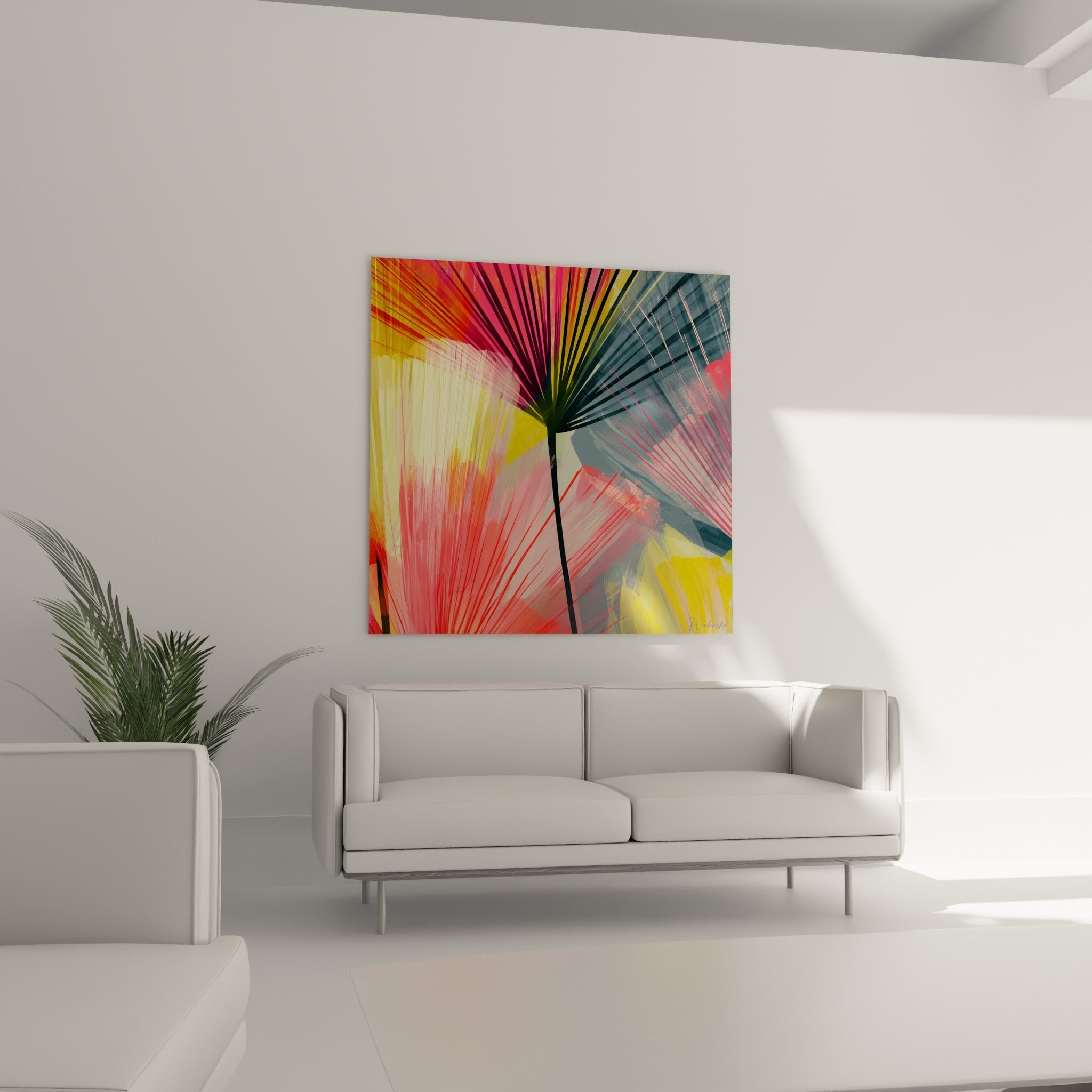 Éventail végétal anthracite et rose vif, disposé au-dessus d'un canapé dans un salon lumineux