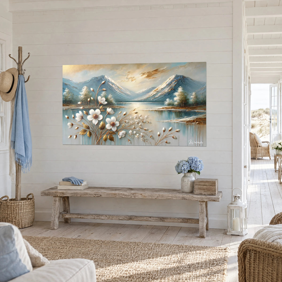 Tableau massif enneigé reflété dans un lac, ciel doré et bleu glacier, accroché au mur d'une entrée en bord de mer