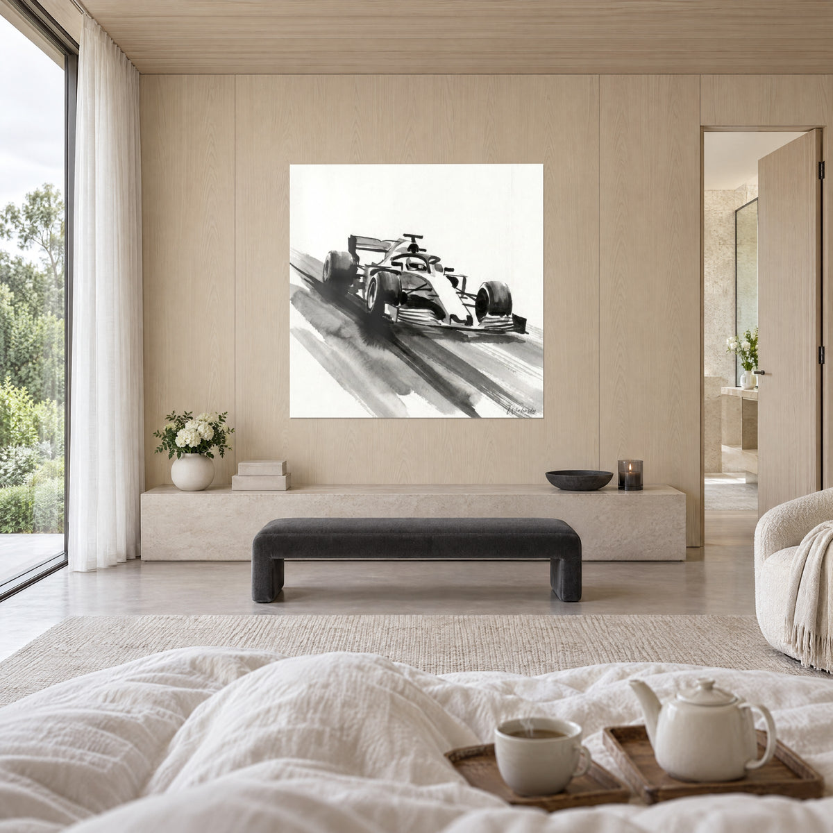 Wall art of an F1 car speeding along a track with broad black and pearl grey brushstrokes, above a bed in a light bedroom