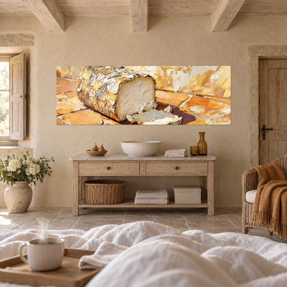 Wall art white cheese roll wrapped in gold leaf, thin slice set in front, orange and cream, above a bed in a bright bedroom