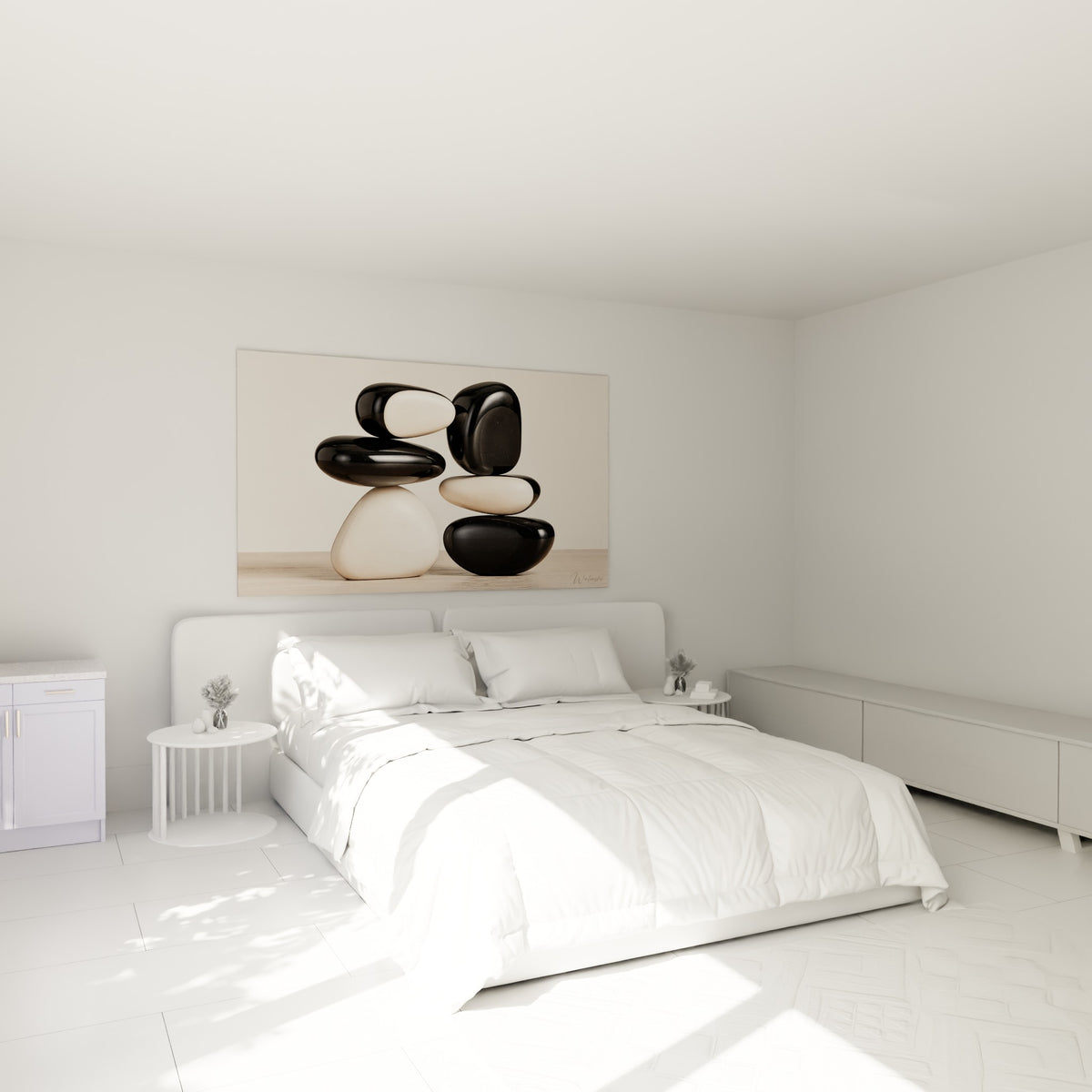 Empilement de galets anthracite et ivoire, surfaces lustrées, au-dessus d'un lit dans une chambre claire