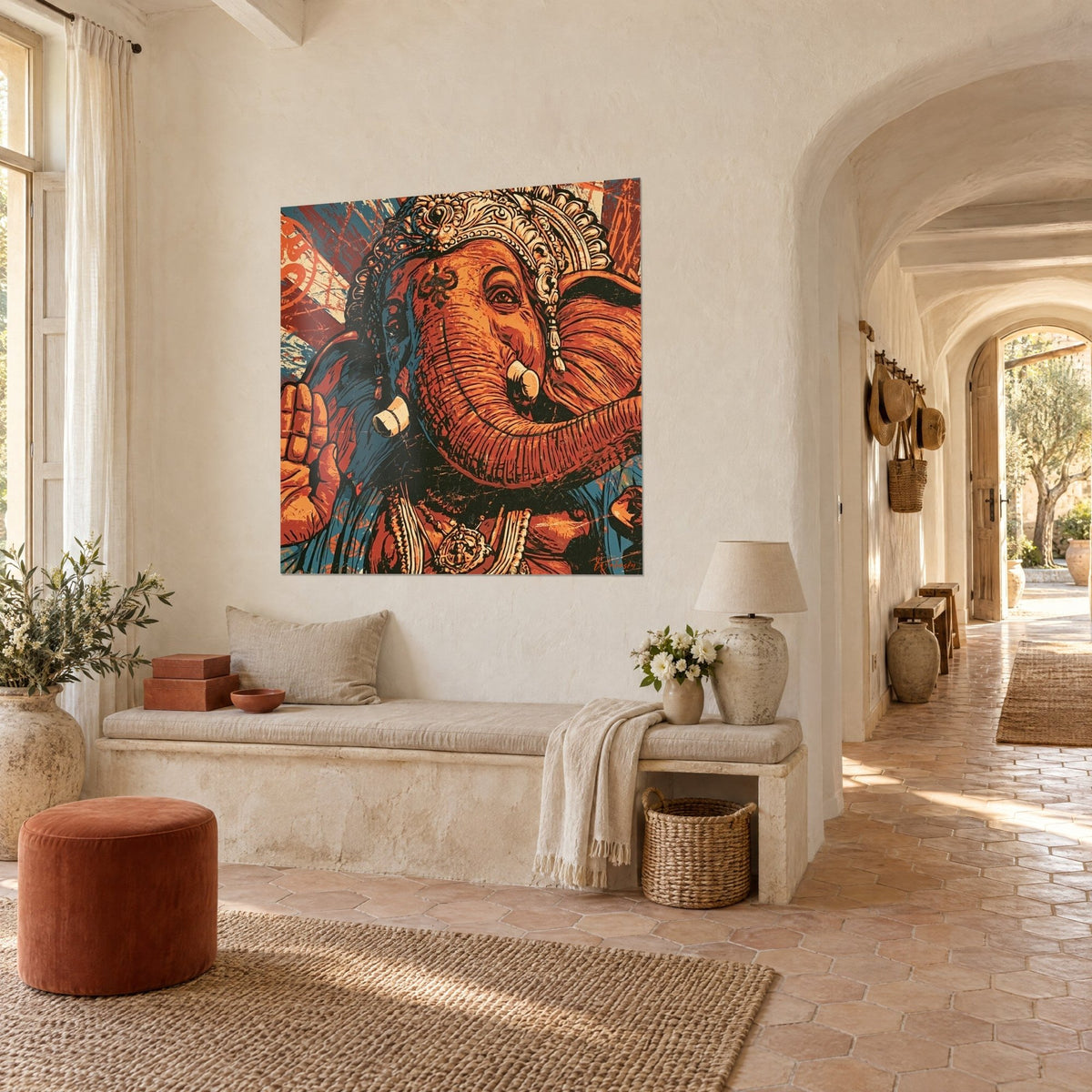 Wall art sacred elephant god in rust and blue screen print, hand raised in blessing, in the stone archway of a Provençal farmhouse
