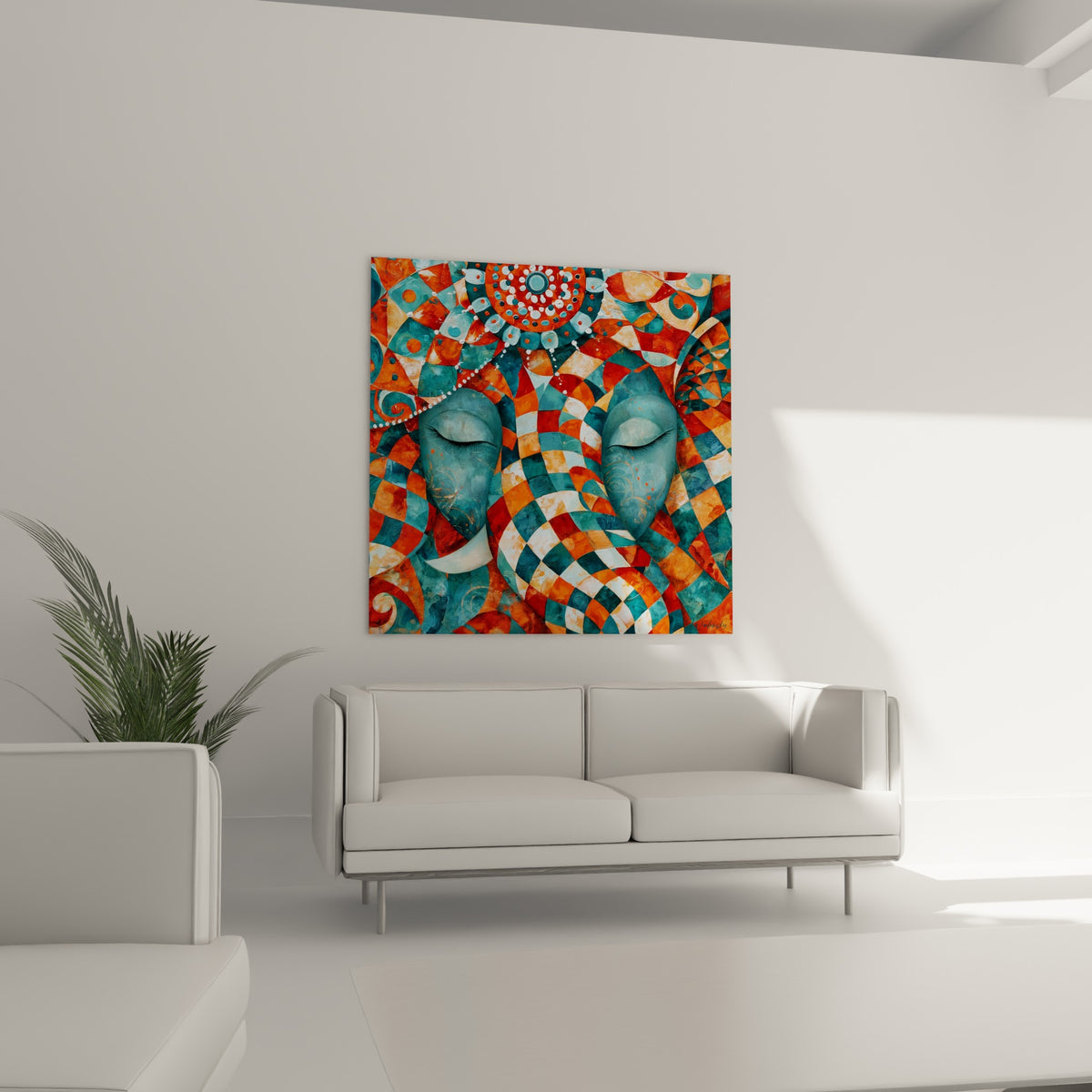 Divinité Ganesh entourée de motifs orange et bleu pétrole, au-dessus d'un canapé dans un salon lumineux