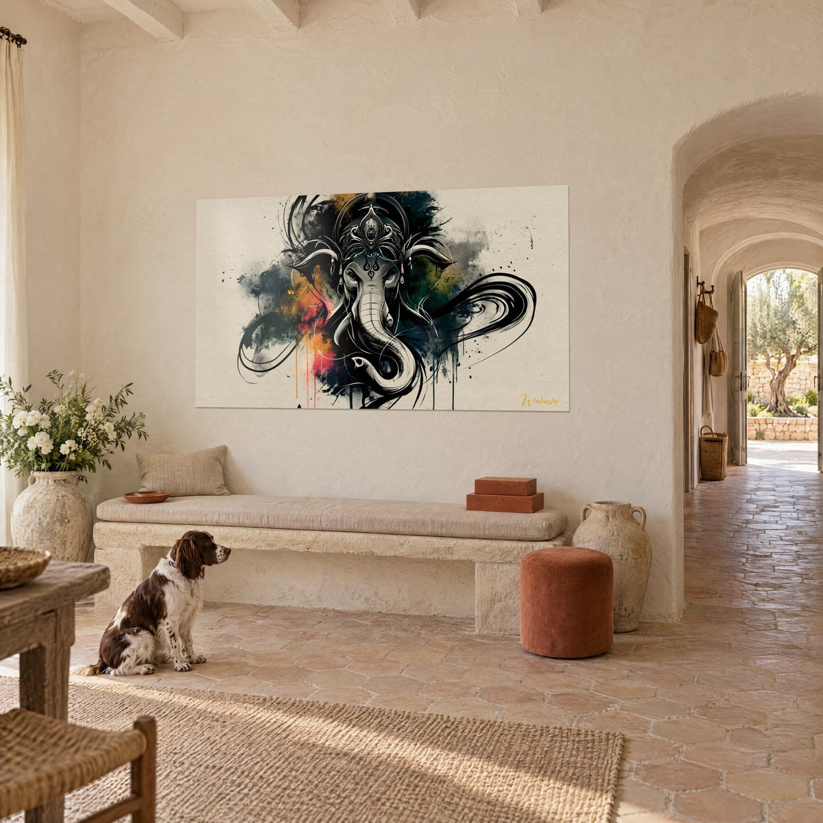 Wall art Ganesh head crowned with ornaments, fir green and orange clouds, beige wall, stone bench of a Provençal farmhouse