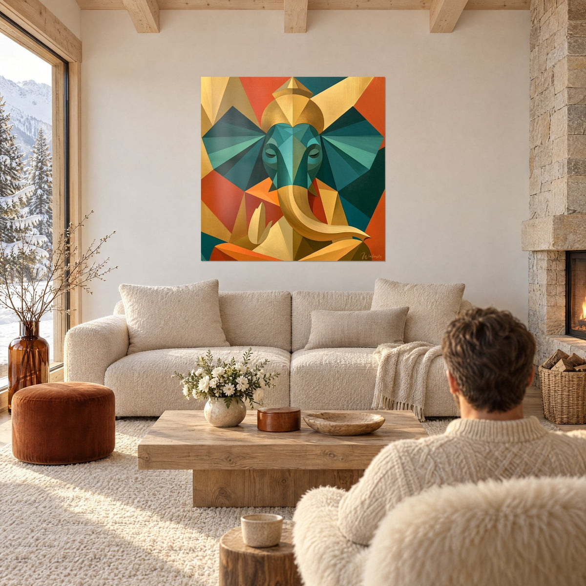 Wall art geometric Ganesh with large emerald ears and golden trunk, terracotta background, above a sofa in a bright living room