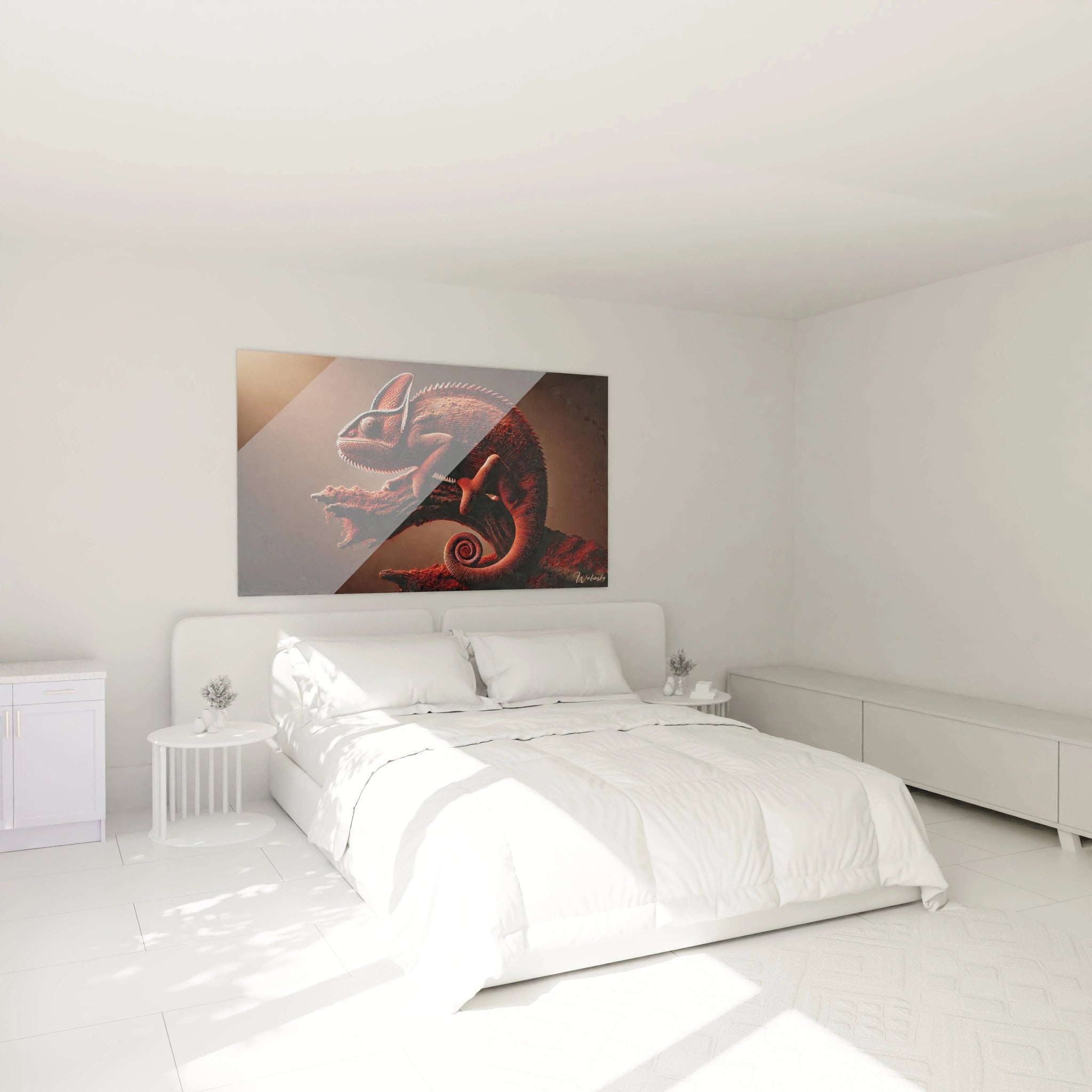 dans une chambre moderne le tableau caméléon apporte chaleur et exotisme au-dessus du lit. Les couleurs chaudes se fondent parfaitement avec l'ambiance cosy et naturelle