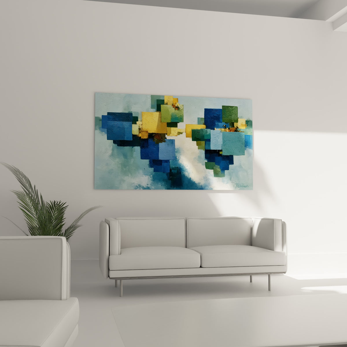 Carrés géométriques abstraits vert sauge et bleu marine disposés au-dessus d'un canapé dans un salon lumineux