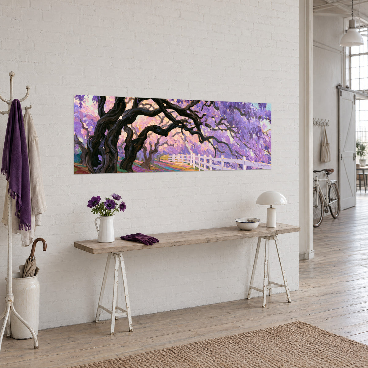 Wall art dark oak with twisted branches under lilac clusters, white fence and peach pink sky, on a loft wall