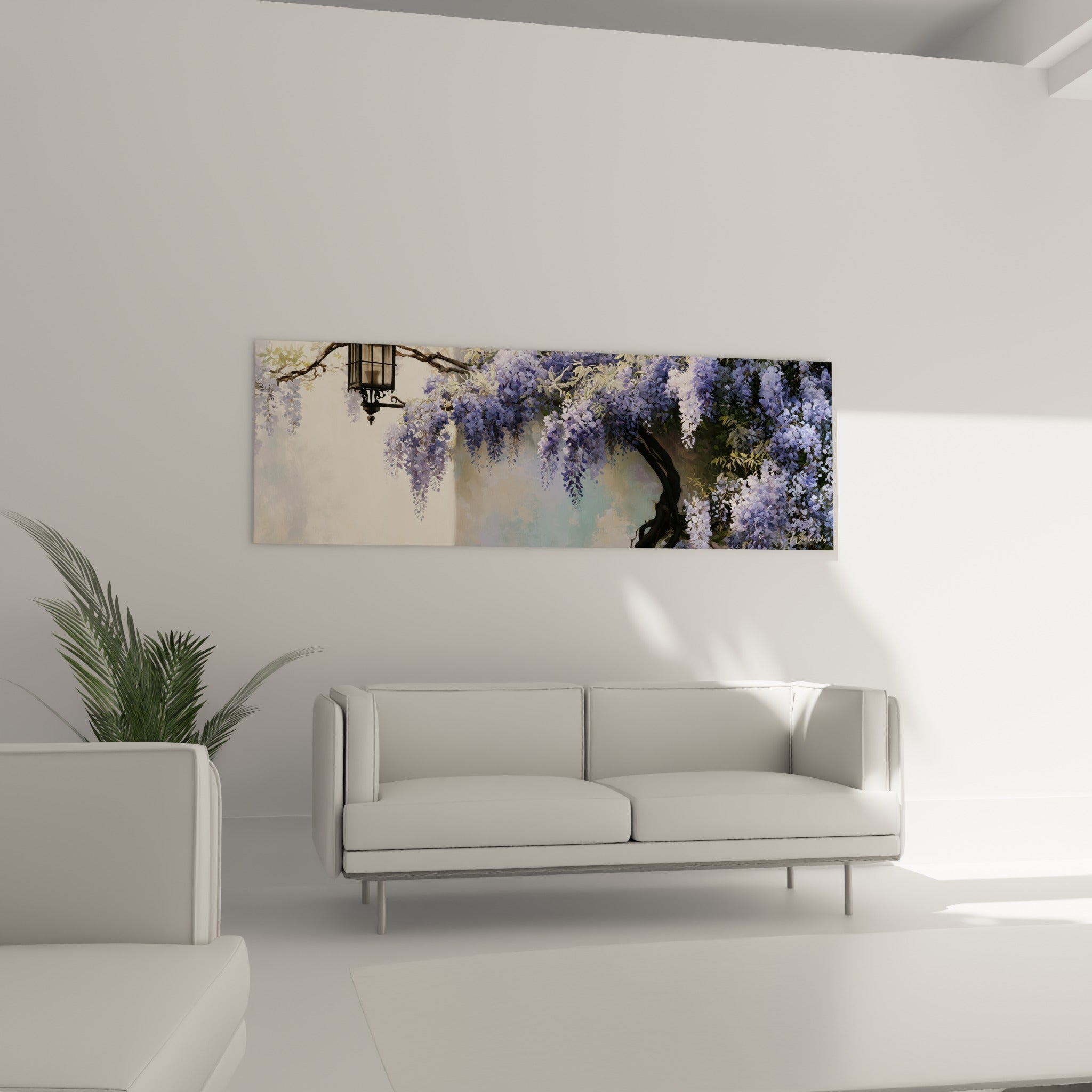 Fleurs de glycine bleu pastel et tronc anthracite au-dessus d'un canapé dans un salon lumineux