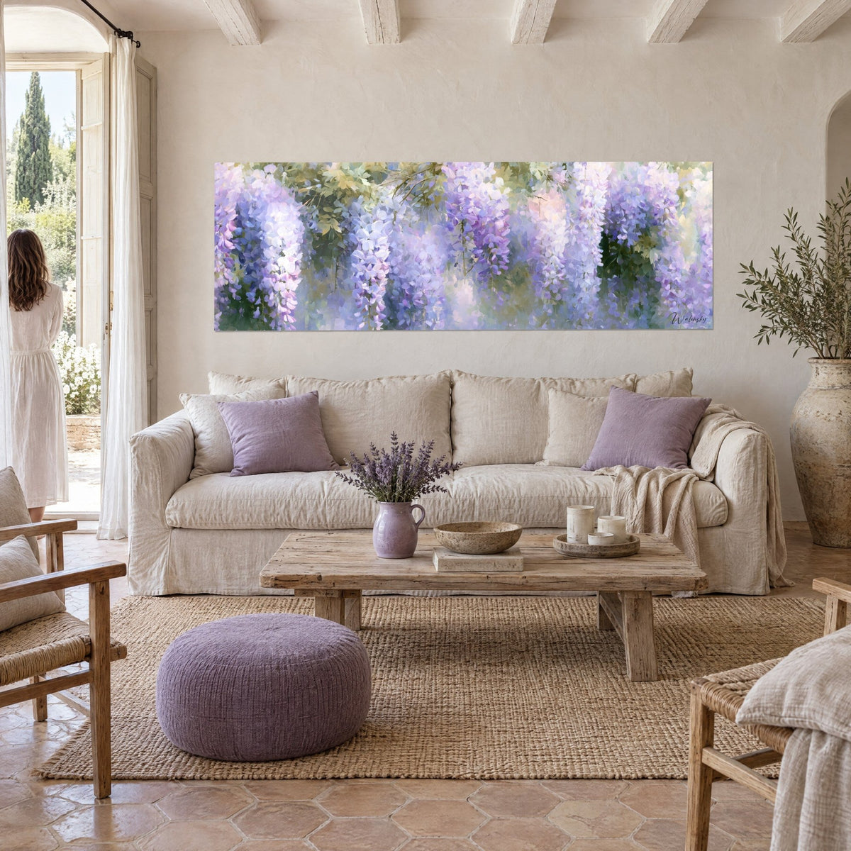 Wall art wisteria in drooping clusters of mauve and white, soft green foliage, above a sofa in a bright living room