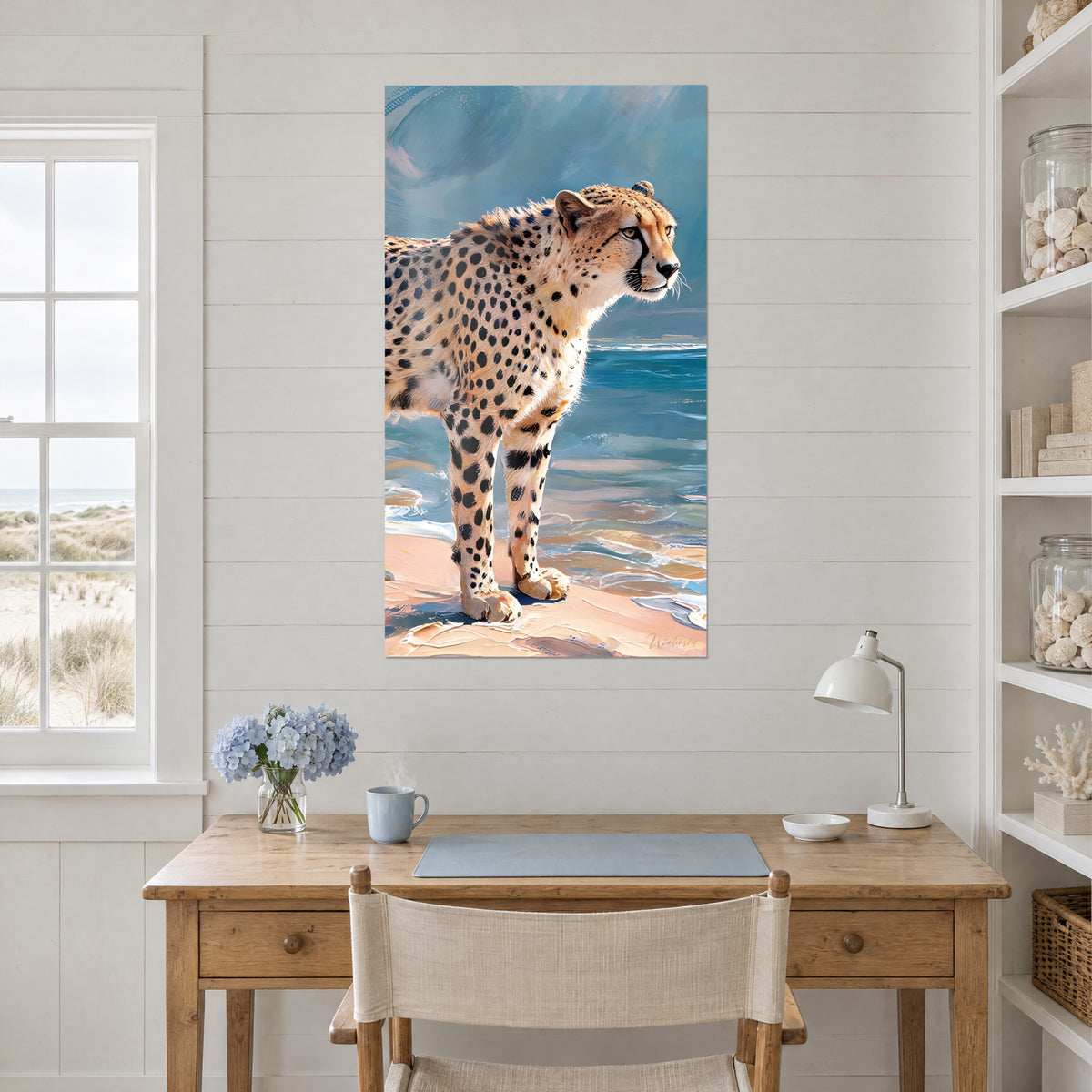 Wall art slender wildcat with amber eyes, white foam and azure water, hung above a light wood desk