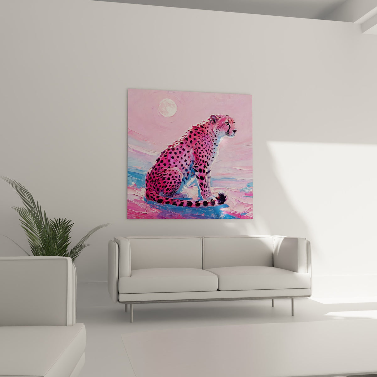 Silhouette féline tachetée rose vif contemplant l'horizon, œuvre suspendue au-dessus d'un canapé dans un salon lumineux