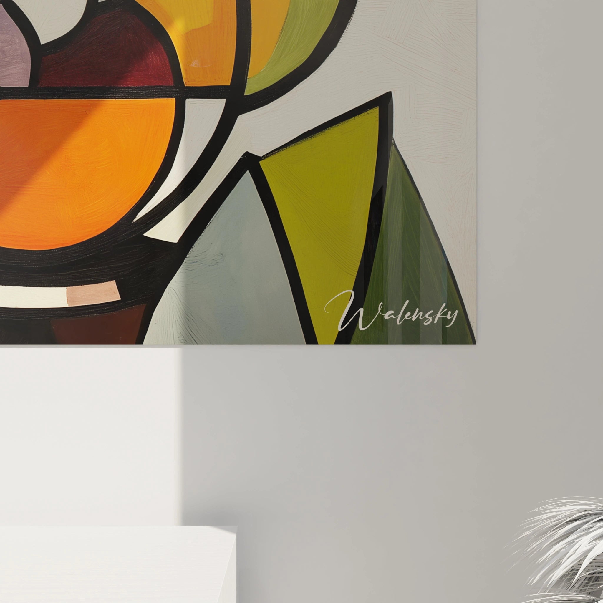 Un tableau Georges Braque caractérisé par une composition cubiste de fruits aux teintes jaune, rouge et vert, présentant des aplats de couleurs vives séparés par des contours noirs définis et des textures nettes.