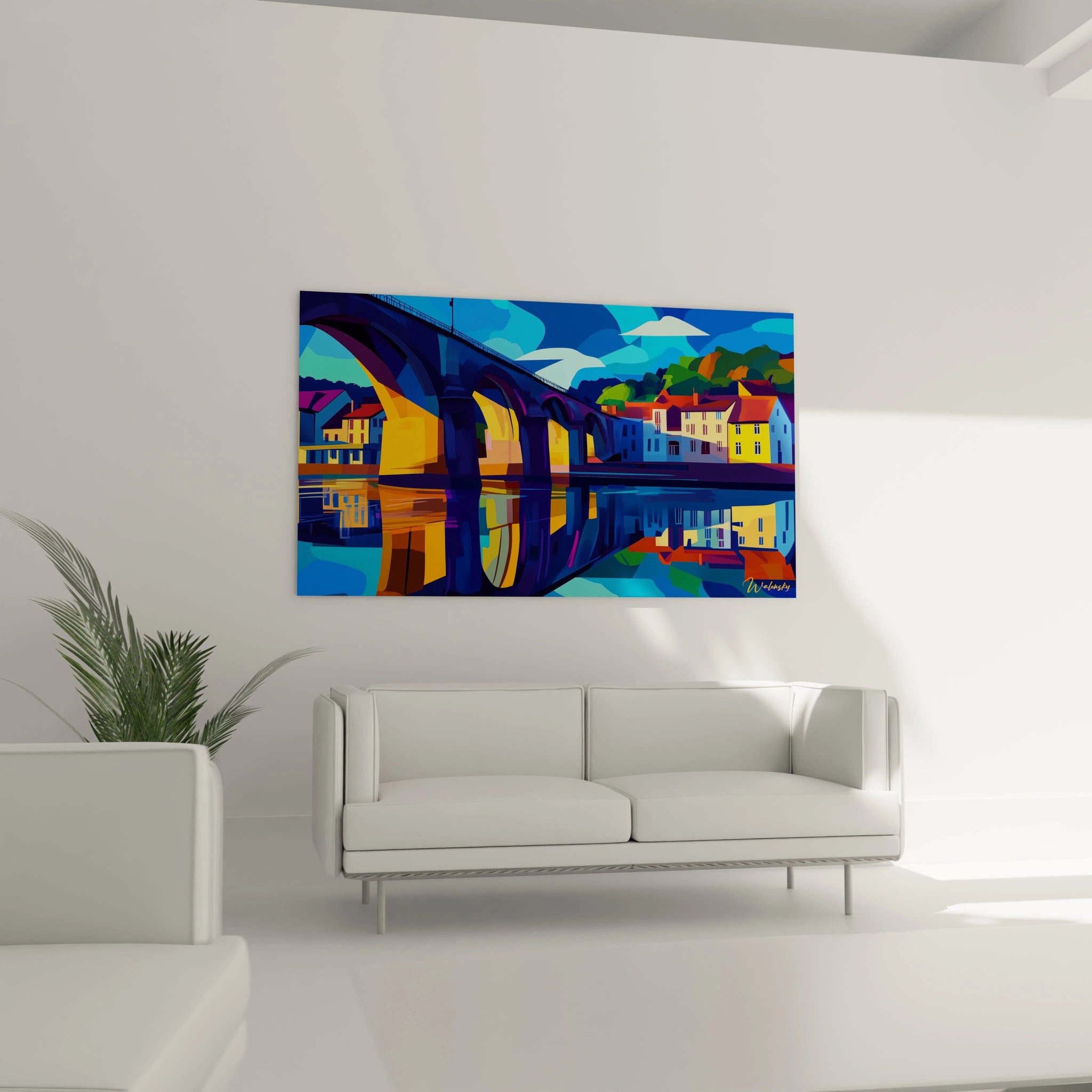 Un tableau Alfred Sisley illustrant un paysage urbain avec un pont et des maisons aux couleurs contrastées. La composition joue sur des formes géométriques et des nuances de bleu, orange et violet.