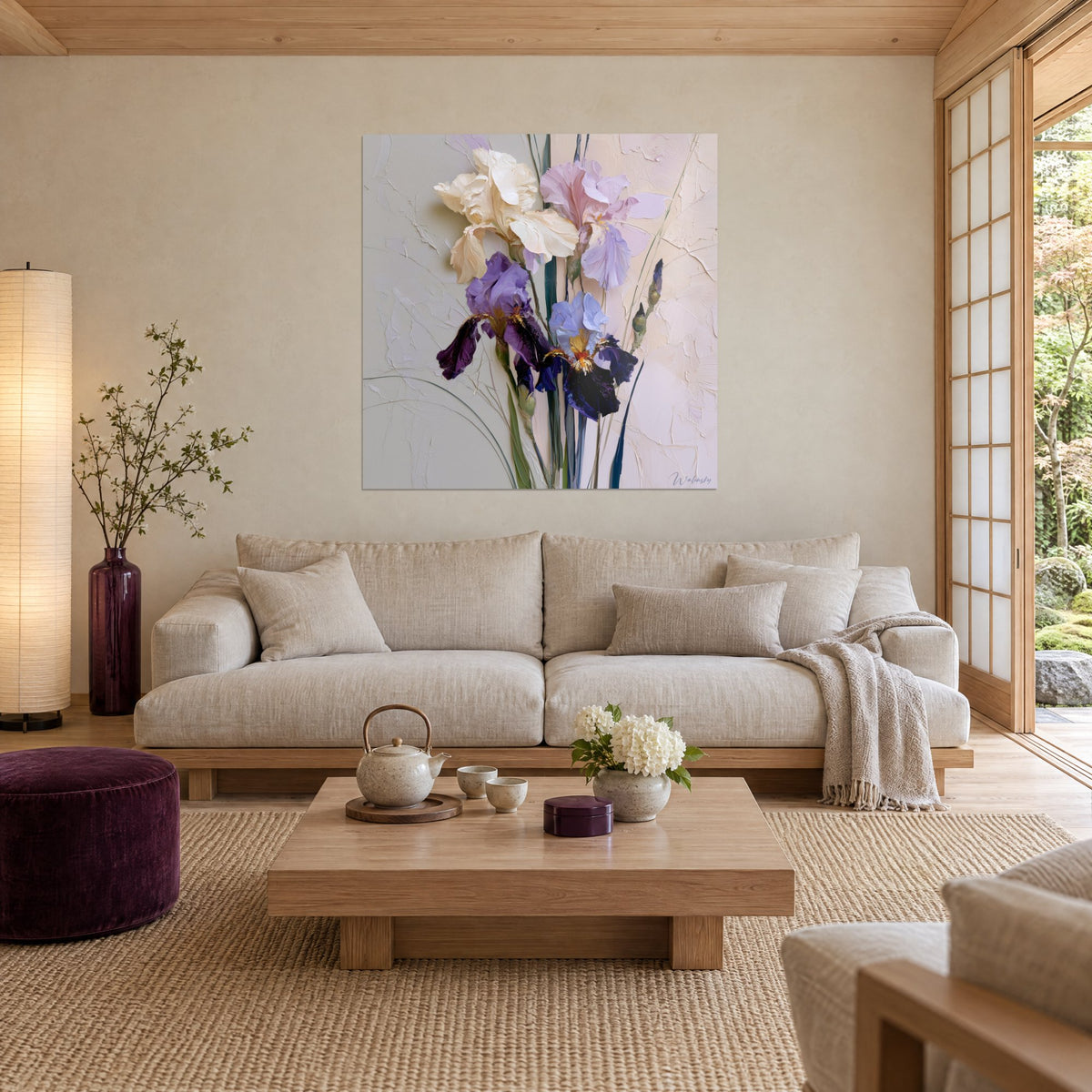 Wall art iris bouquet in ivory, lilac and violet with thick paint strokes, above a sofa in a bright living room