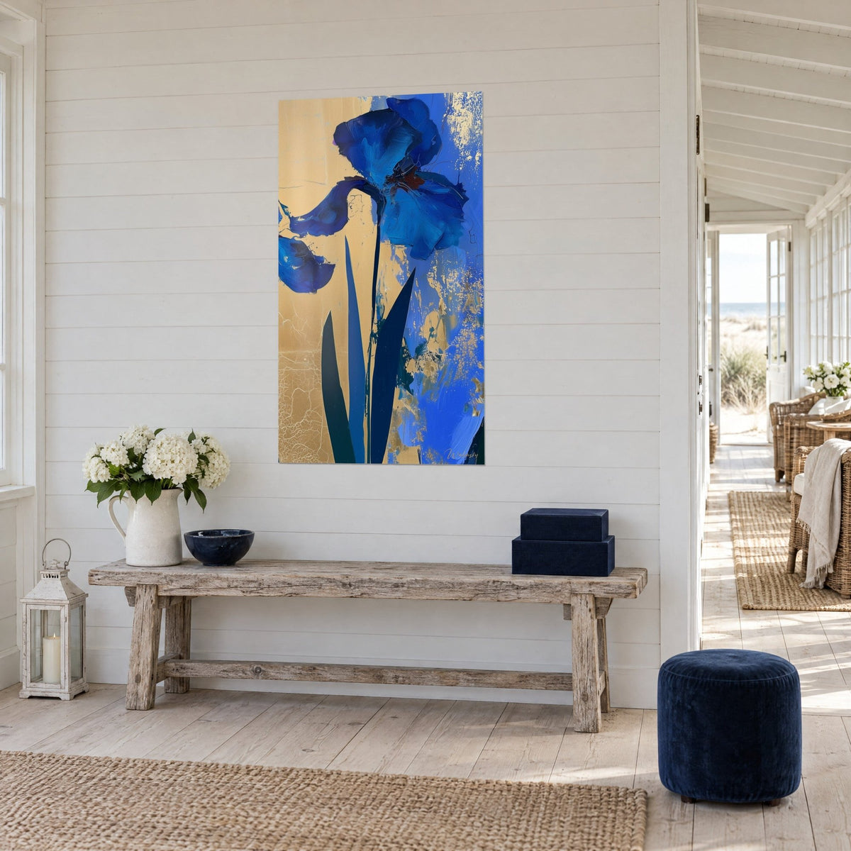 Wall art with indigo and gold iris flower, pointed dark green leaves, three-quarter view in a seaside home