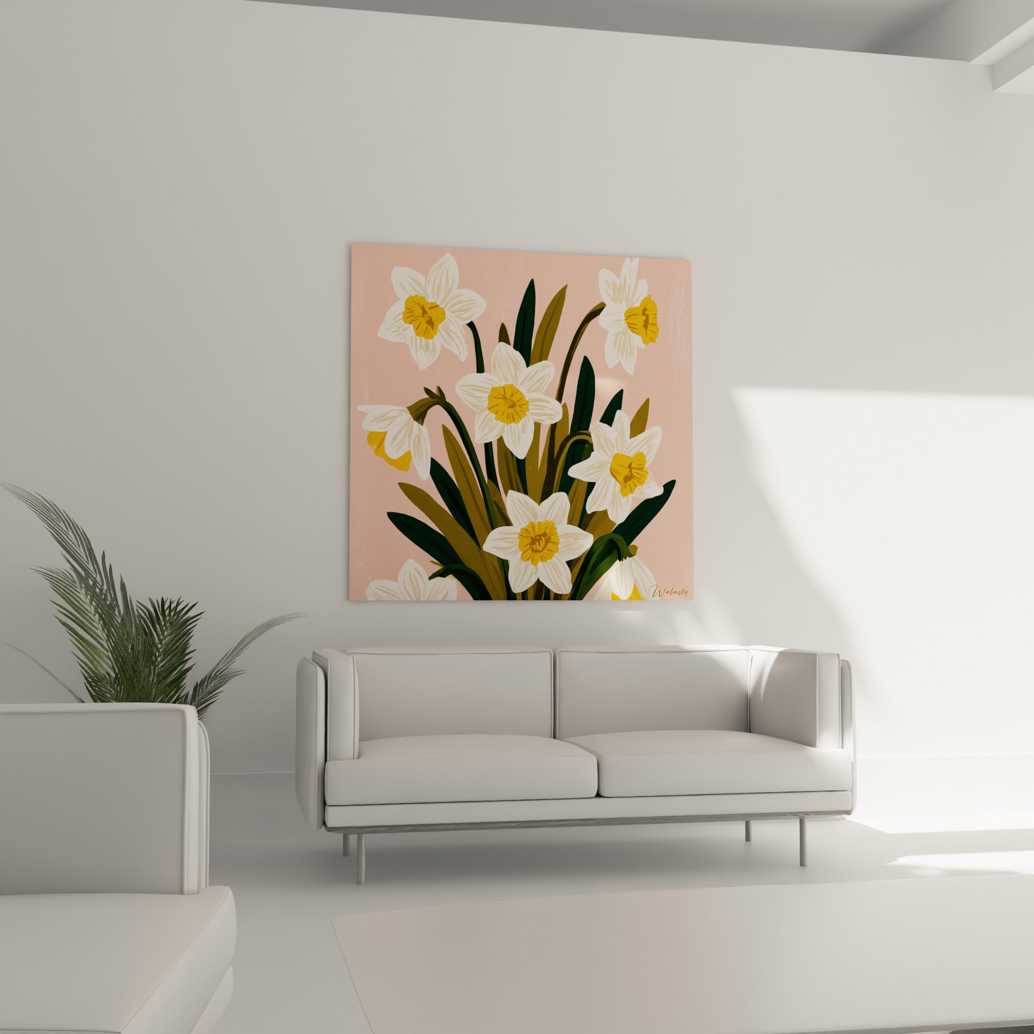 Fleurs de jonquille blanches à cœur doré sur rose tendre, au-dessus d'un canapé dans un salon lumineux