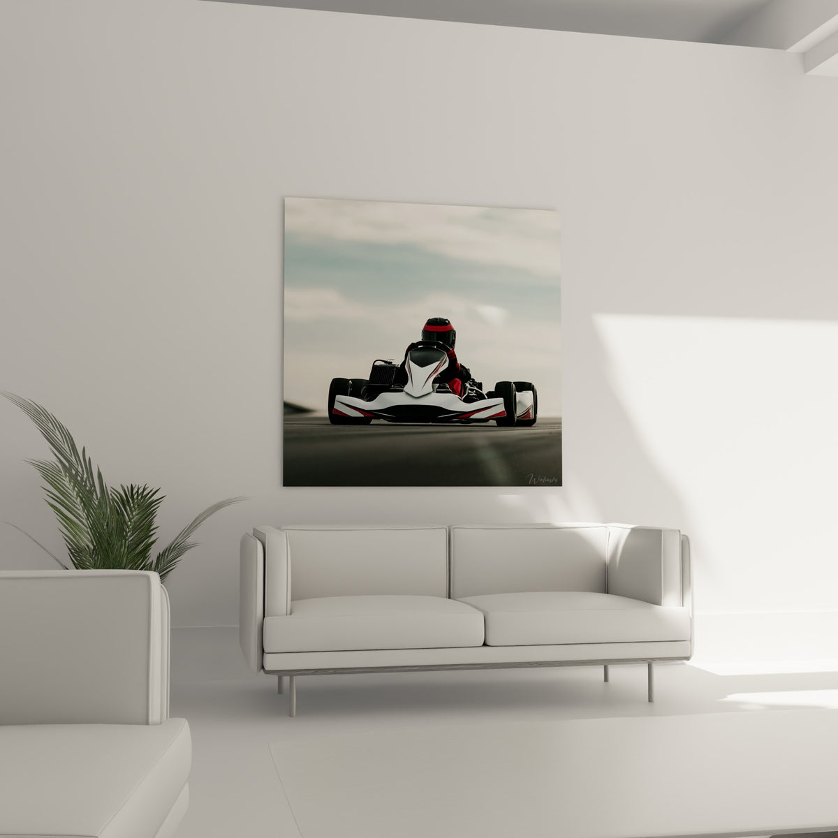Kart blanc strié de rouge vif fonçant sur asphalte gris, au-dessus d'un canapé dans un salon lumineux