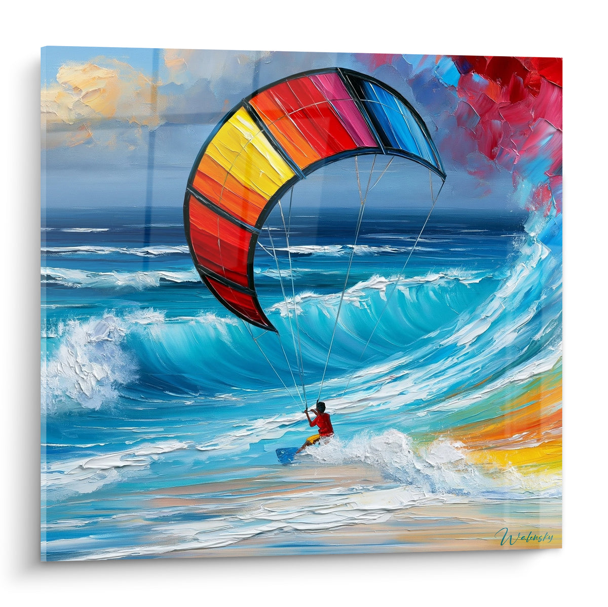 Kitesurfeur en action sur voile rouge et jaune face à une vague turquoise éclatante