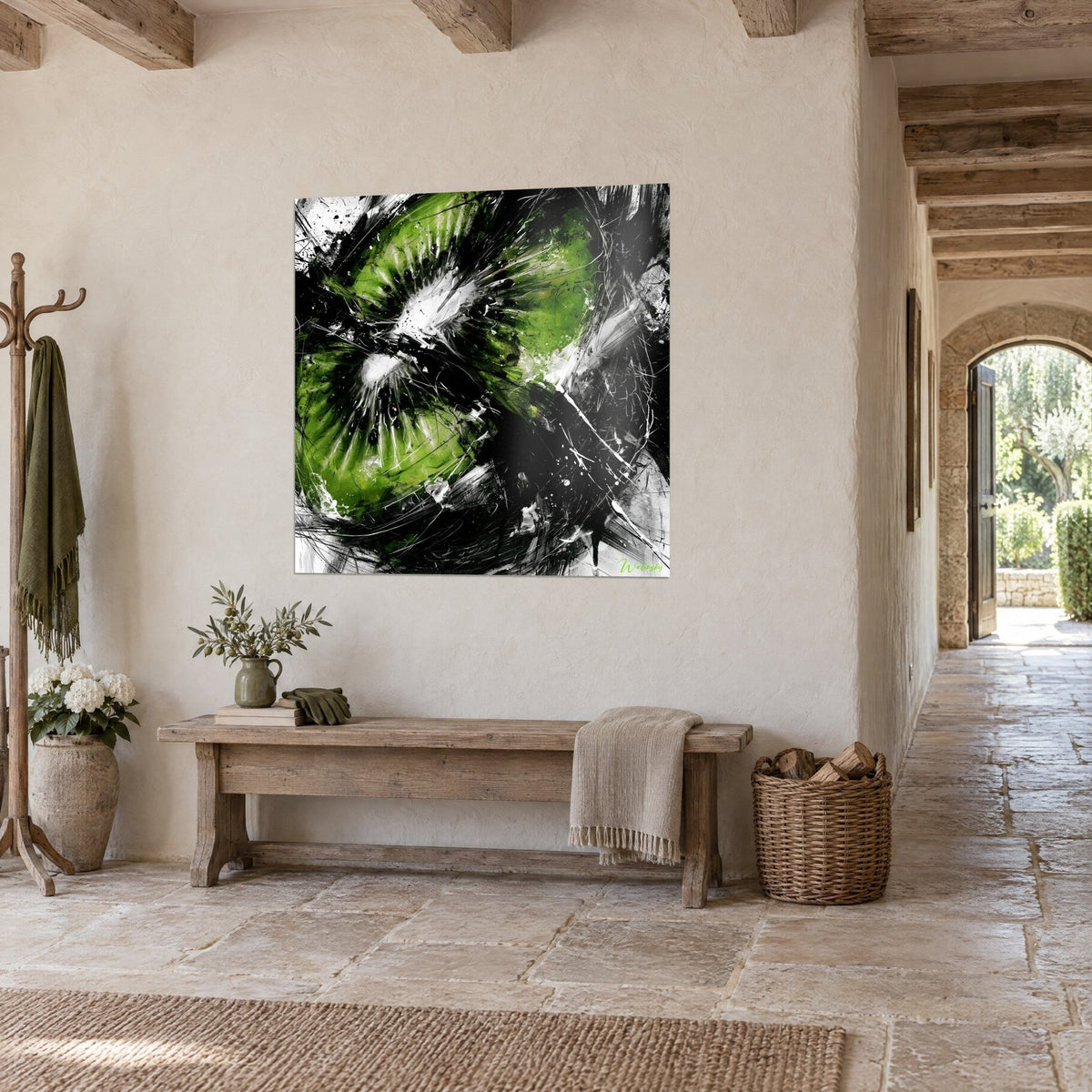 Wall art burst fruit with radiant black seeds, apple green and off-white, hung beside a wooden bench in a stone house
