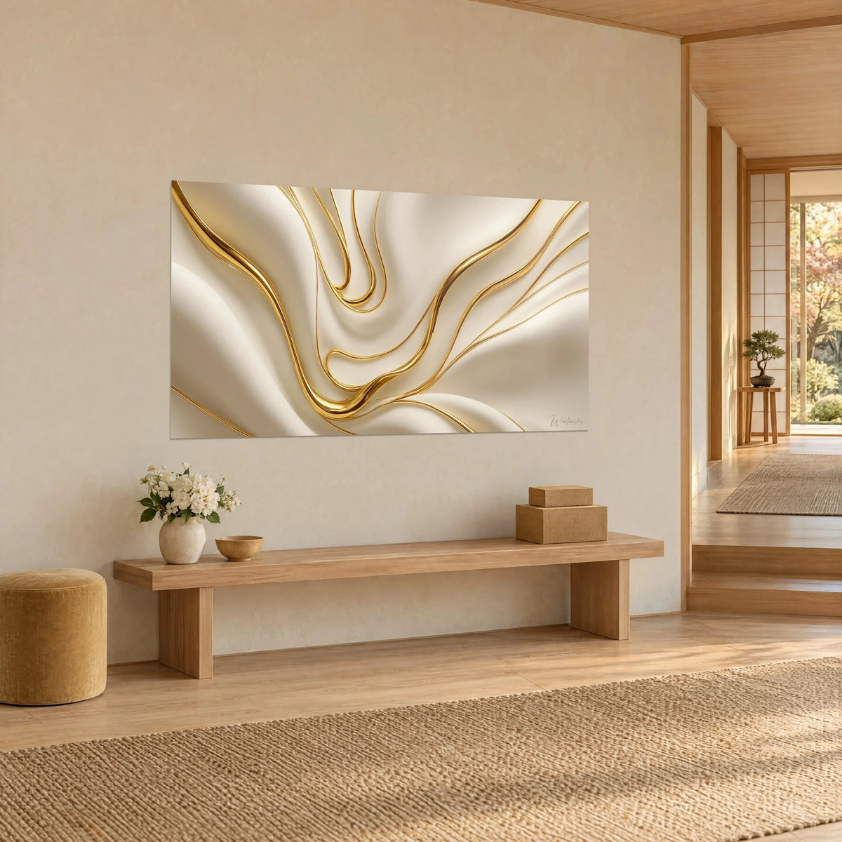 Wall art with shimmering golden swirls on ivory satin, three-quarter view beside a light wood bench and an ochre stool